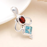 925 Sterling Silver with Blue topaz & Garnet Pendant