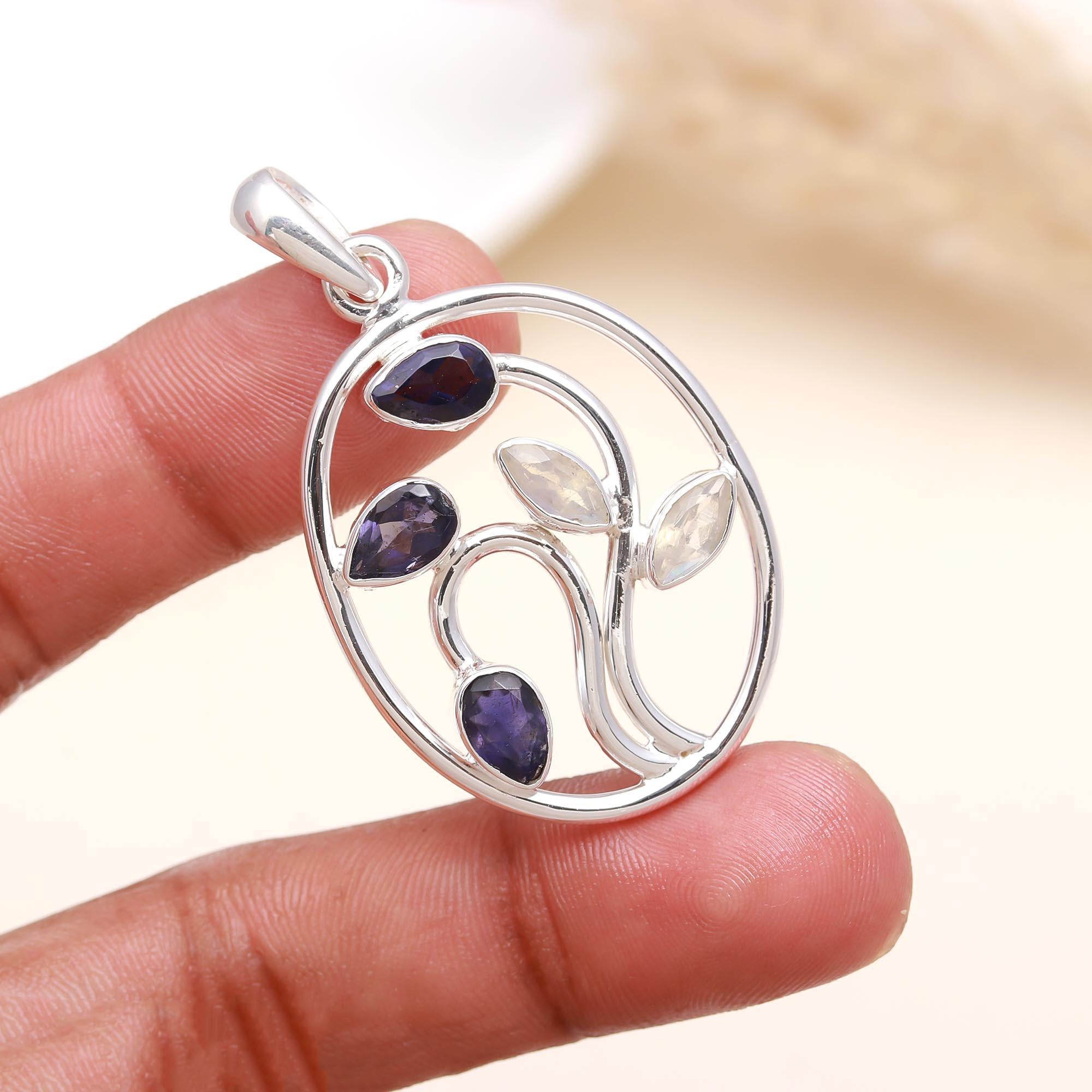 Silver Pendant Studded With Faceted Iolite