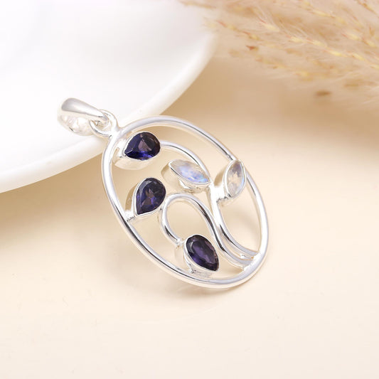 Silver Pendant Studded With Faceted Iolite