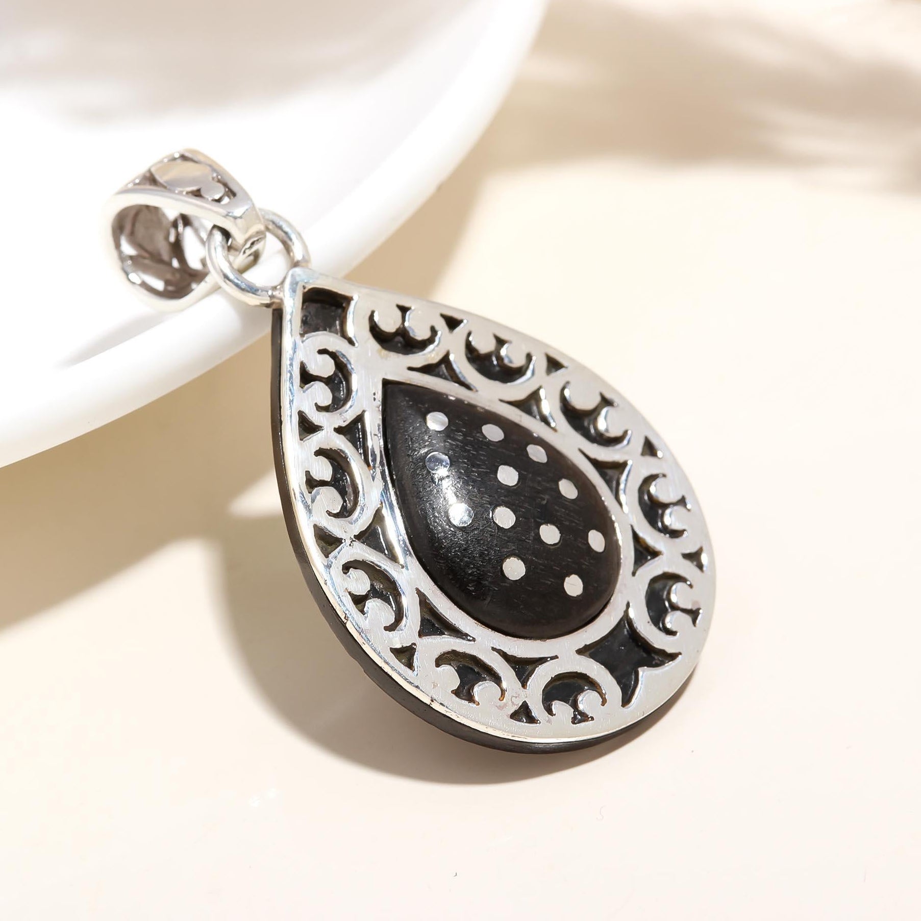 The Midnight Teardrop: Black Onyx Dotted Scroll Filigree Silver Pendant