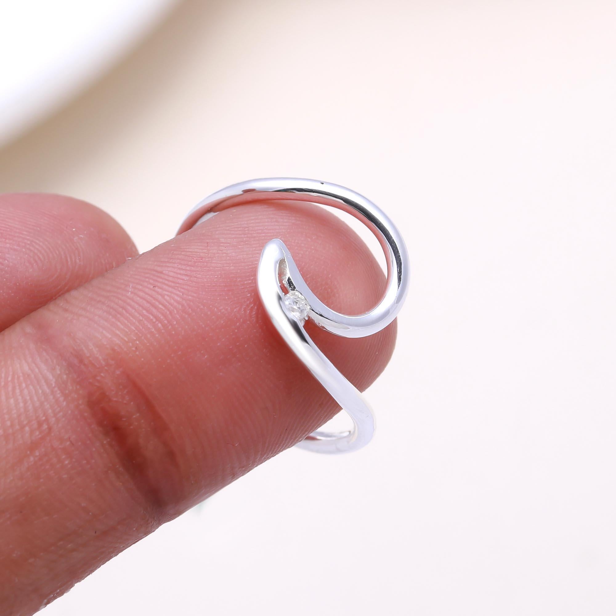 The Fluid Sparkle: Cubic zirconia Open Swirl Ring