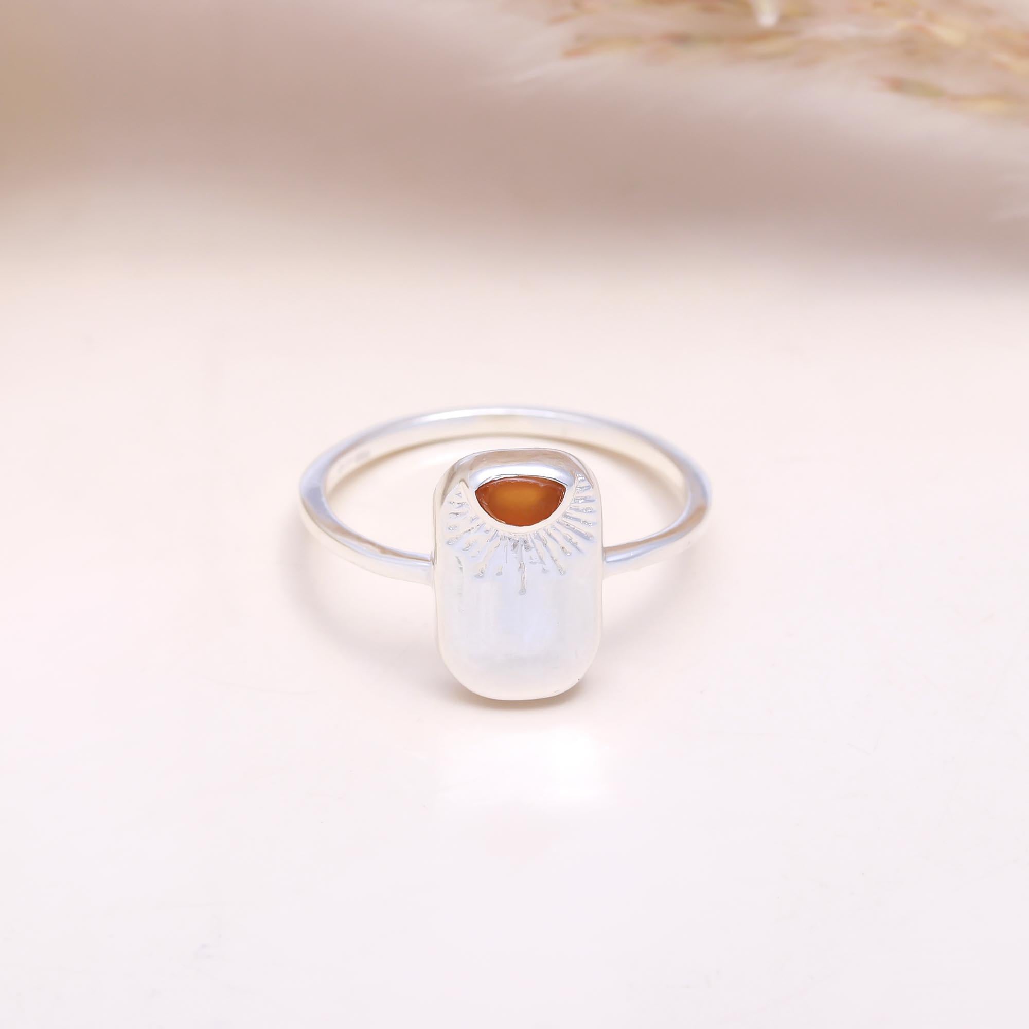 The  Evening Glow: Carnelian Sunburst Signet Ring