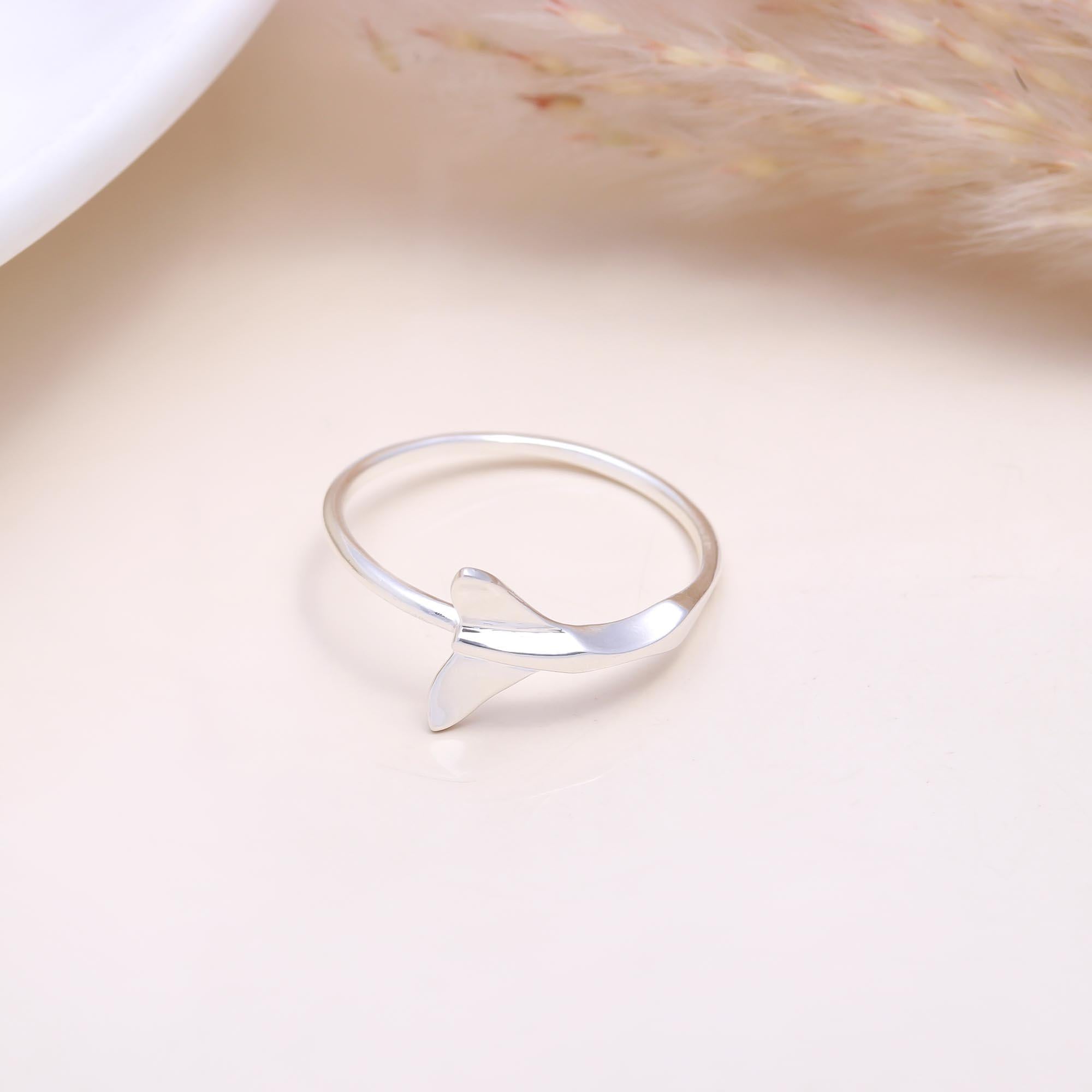 The Ocean's Tale: Minimalist Silver Whale Tail Ring