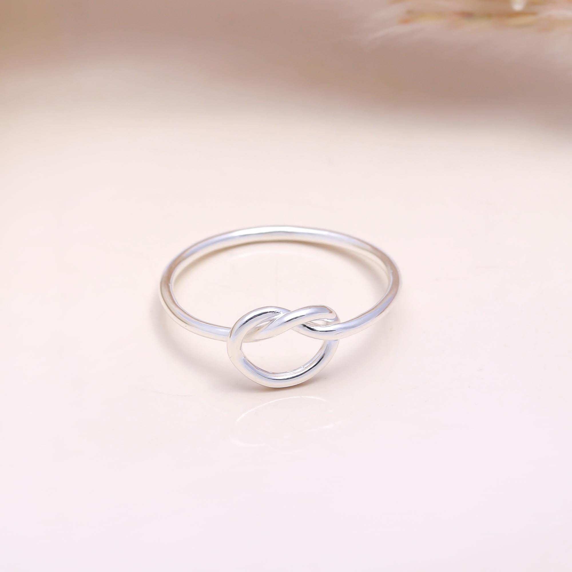 The Endless Bond: Minimalist Silver Love Knot Ring