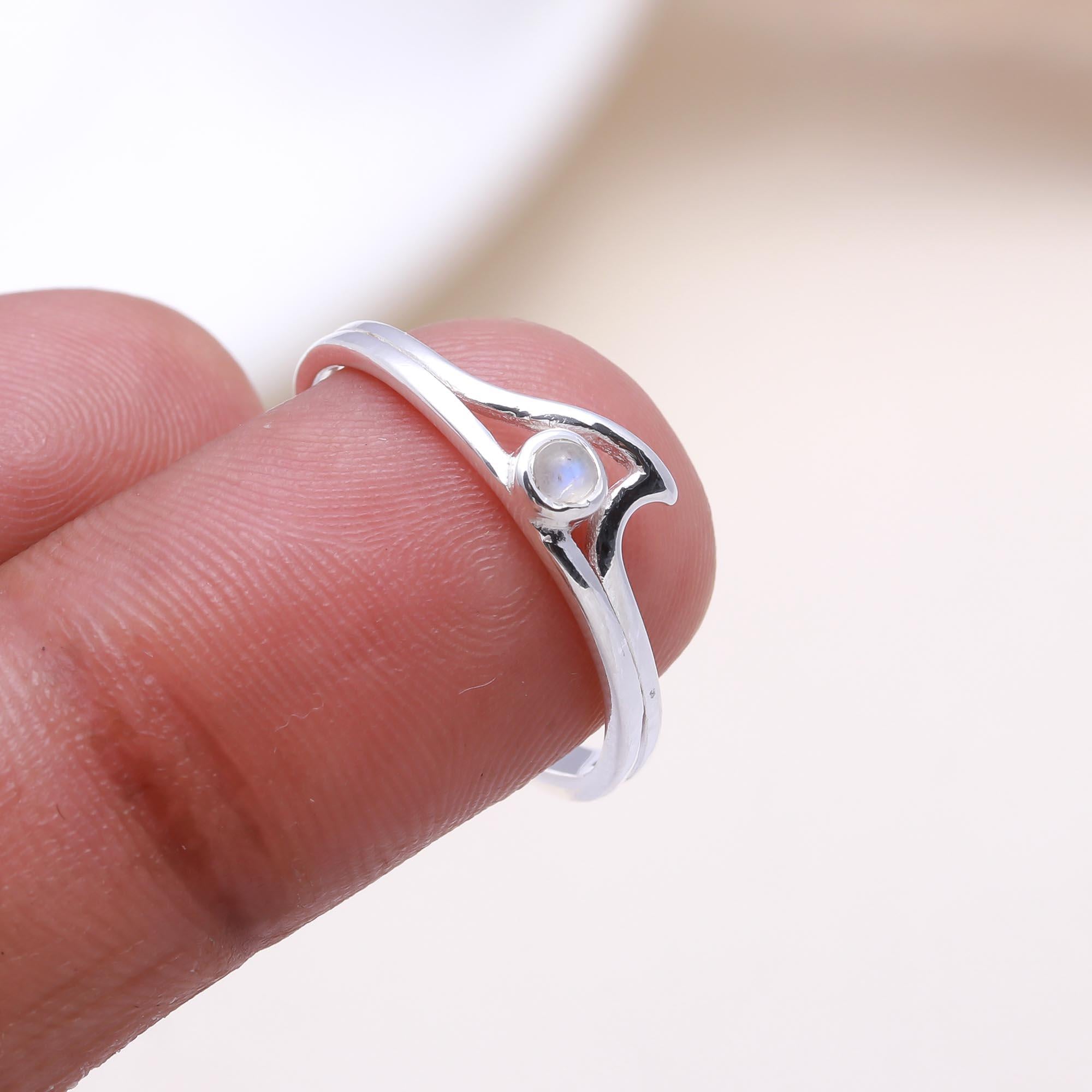 The Ocean Embrace: Moonstone Wave Ring