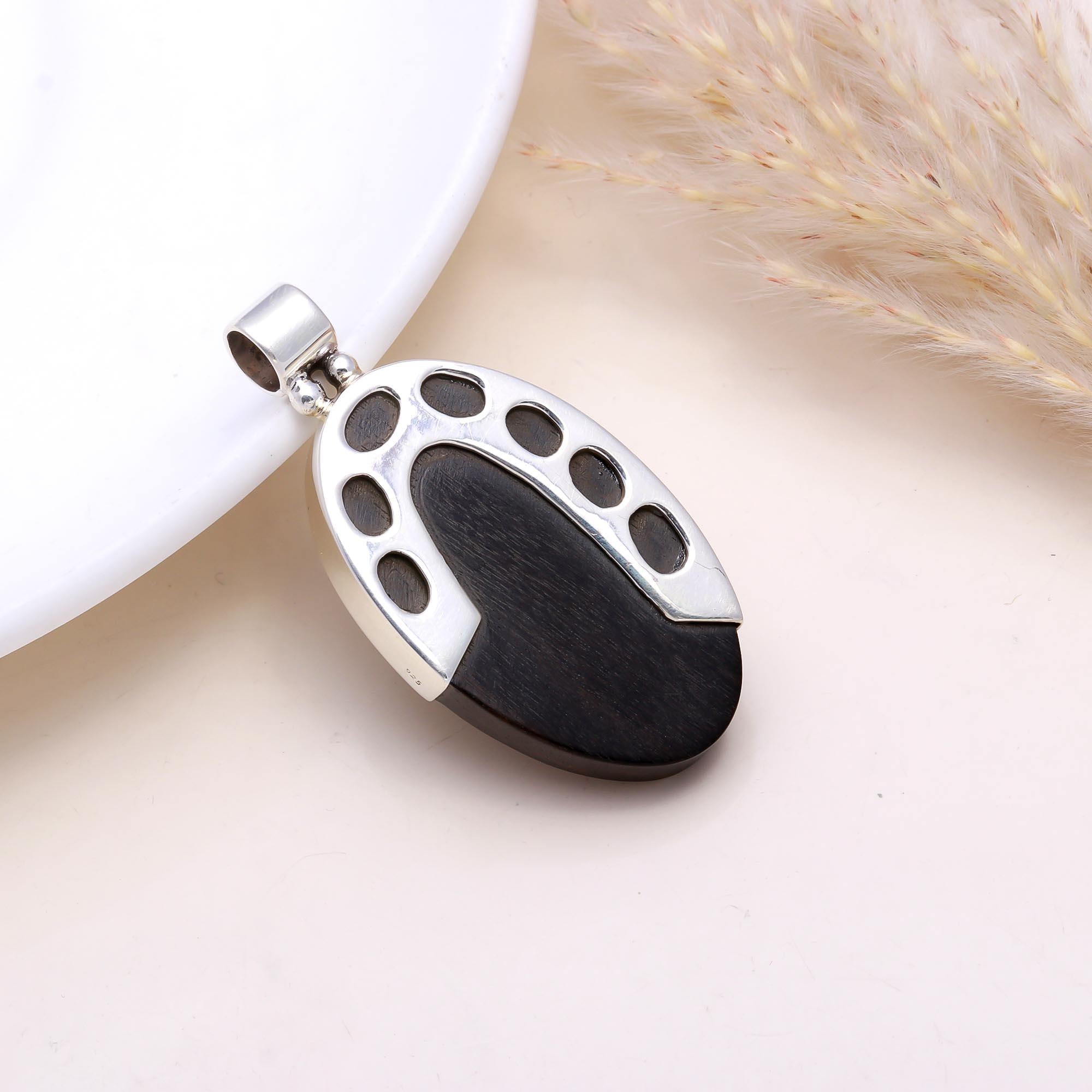 The Ebony Oval: Silver & Black Wood Oval Pendant