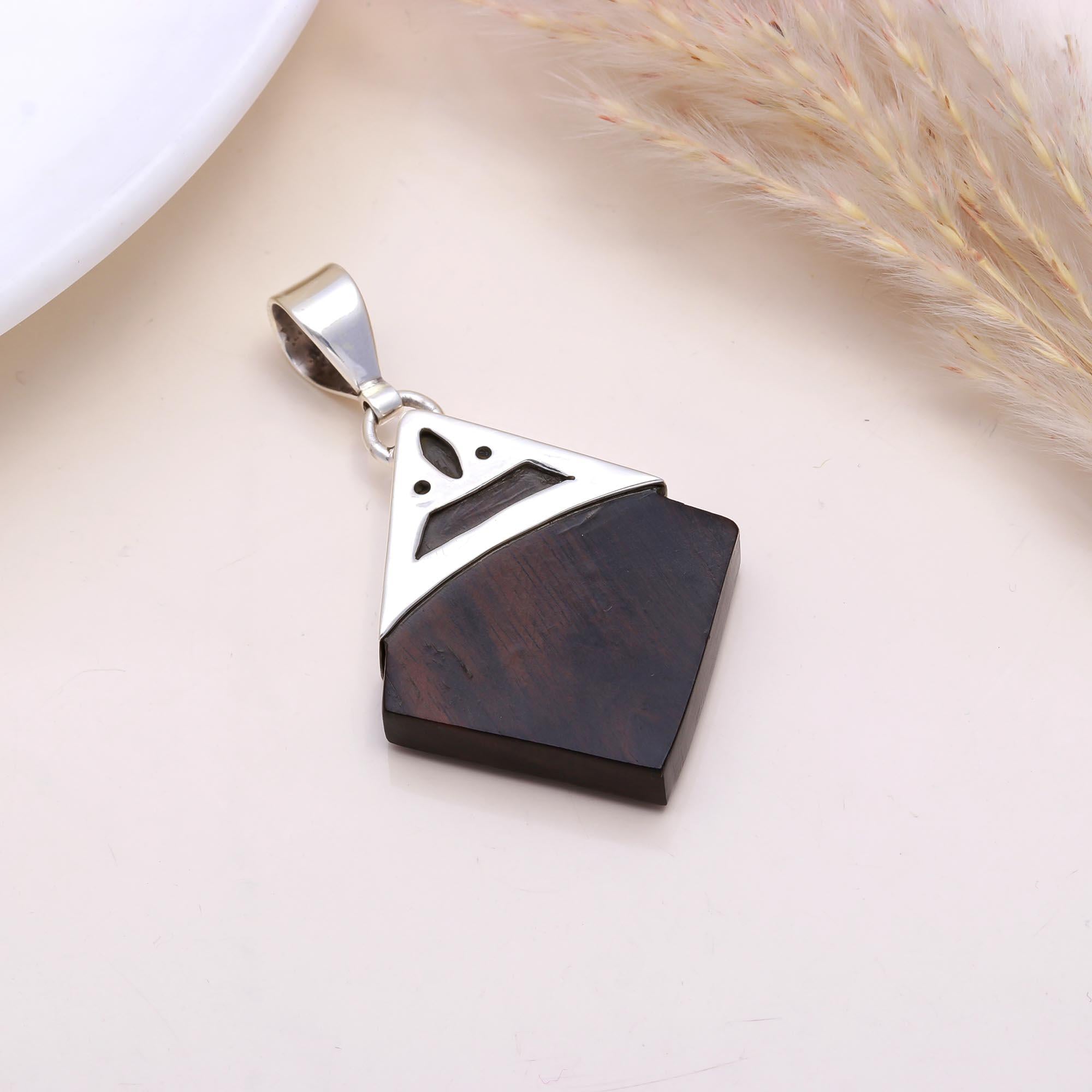 The Ebony Shield: Silver & Wood Triangle Pendant