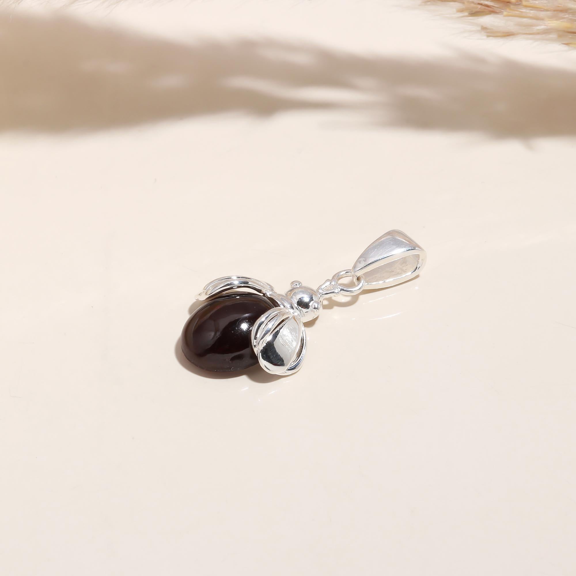 The Crimson Bee: Garnet Insect Motif Silver Pendant