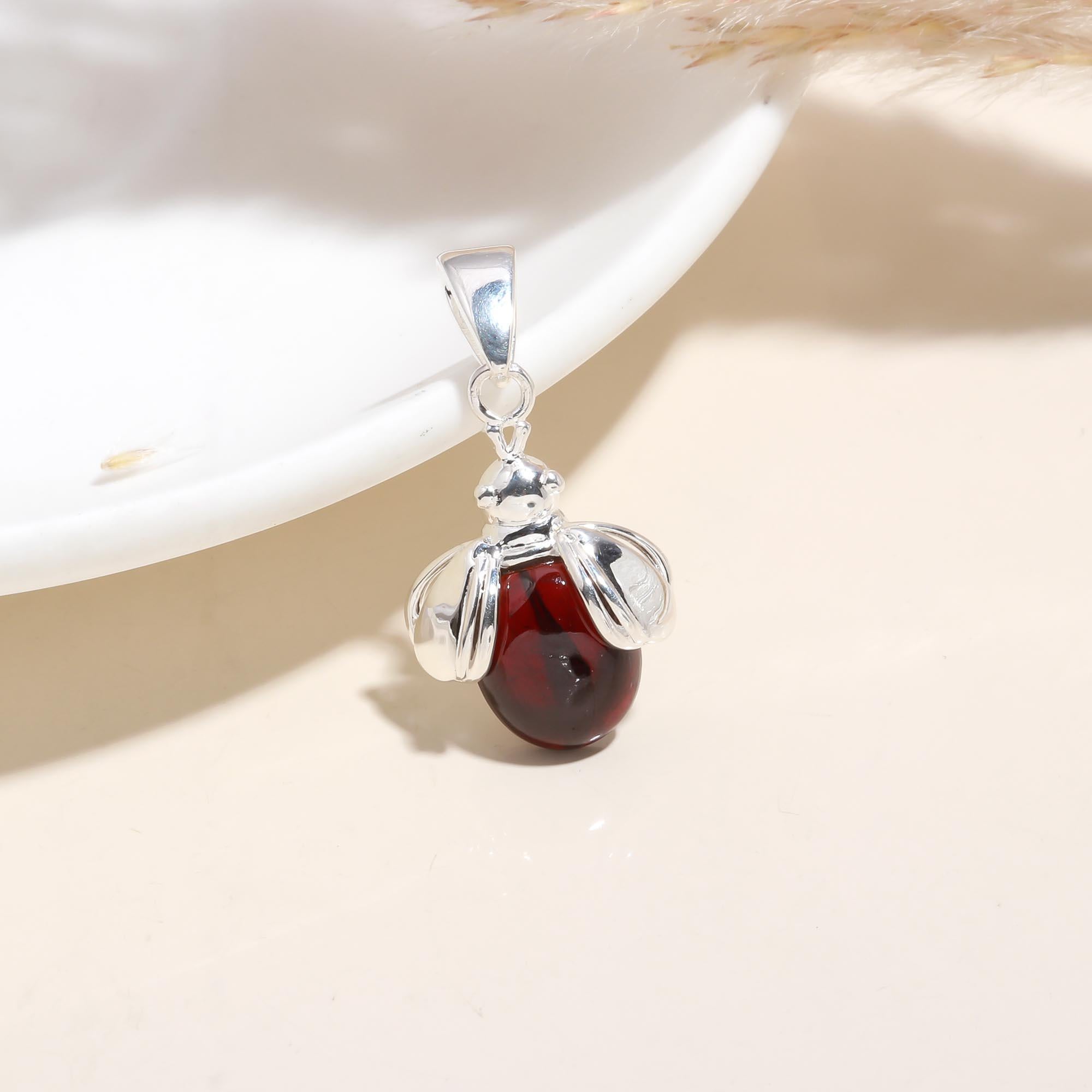 The Crimson Bee: Garnet Insect Motif Silver Pendant