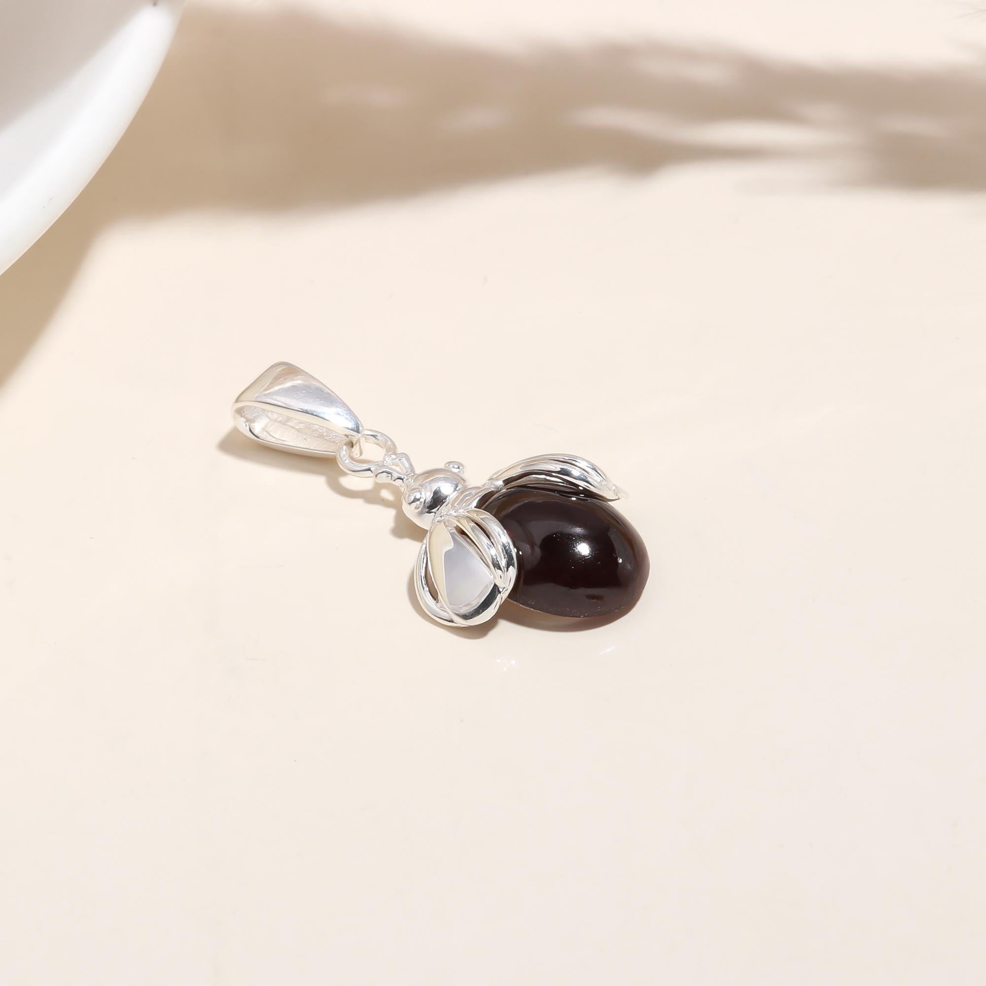 The Crimson Bee: Garnet Insect Motif Silver Pendant