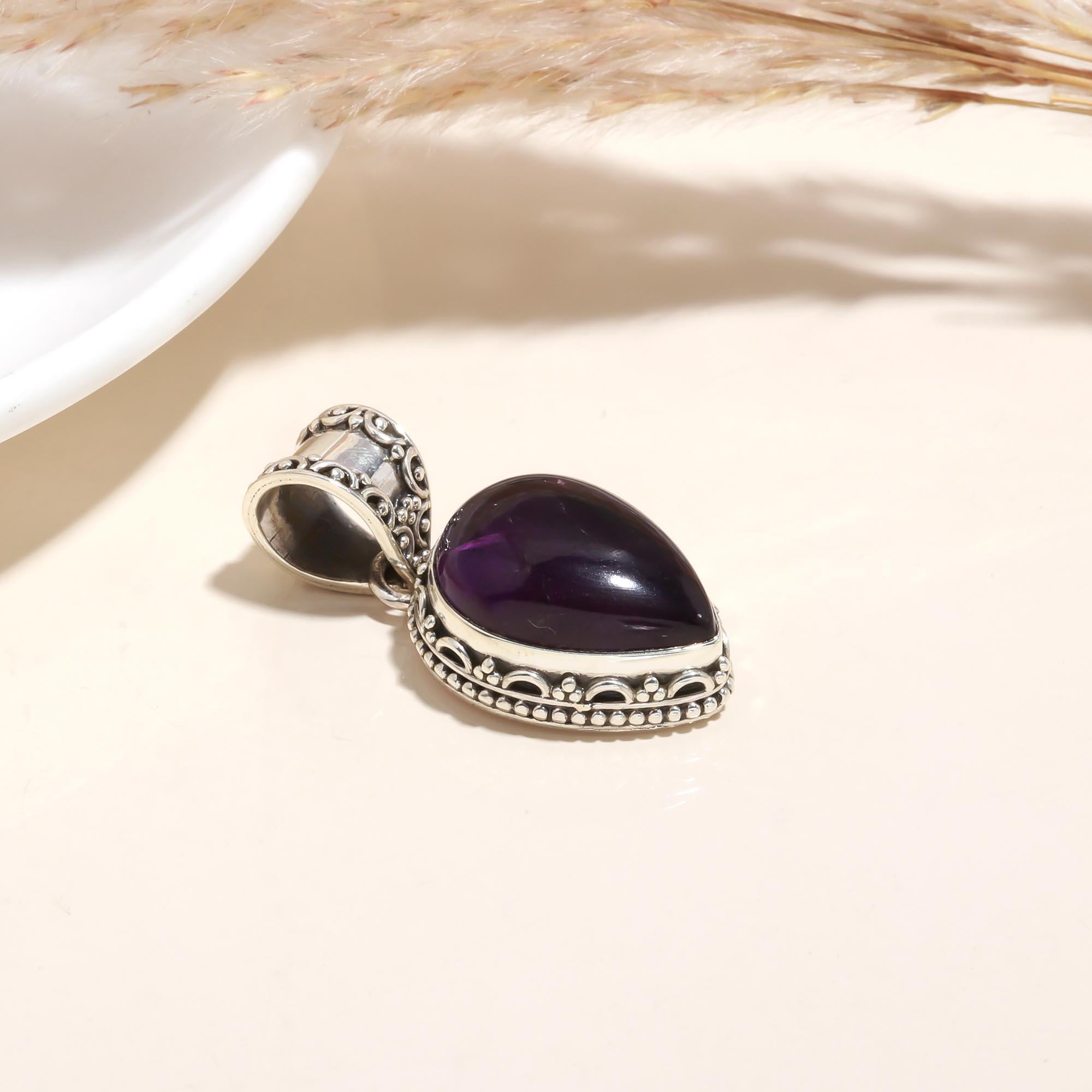 The Balinese Amethyst: Intricate Teardrop Silver Pendant