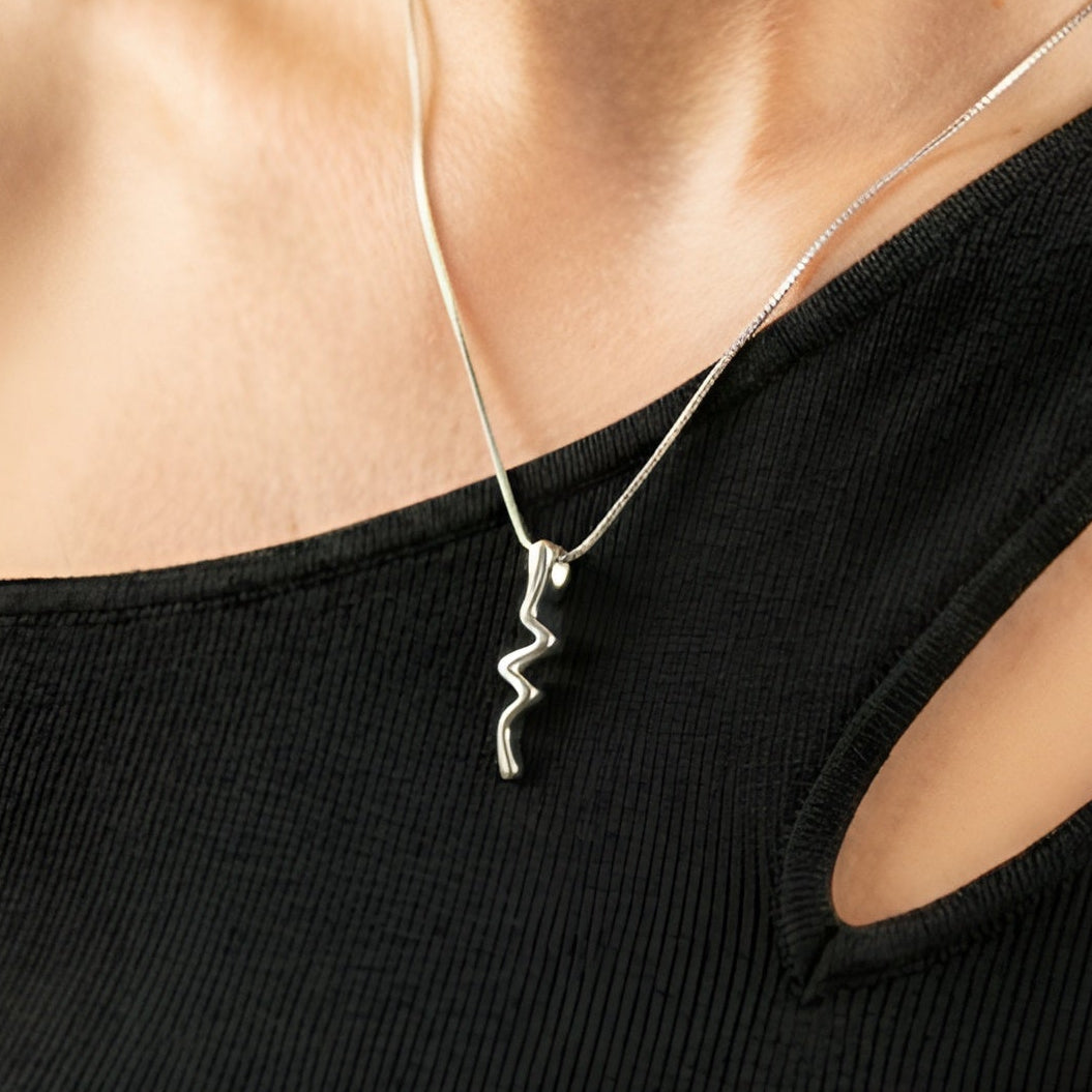 The Silver Current: Abstract Sterling Silver Wave Pendant