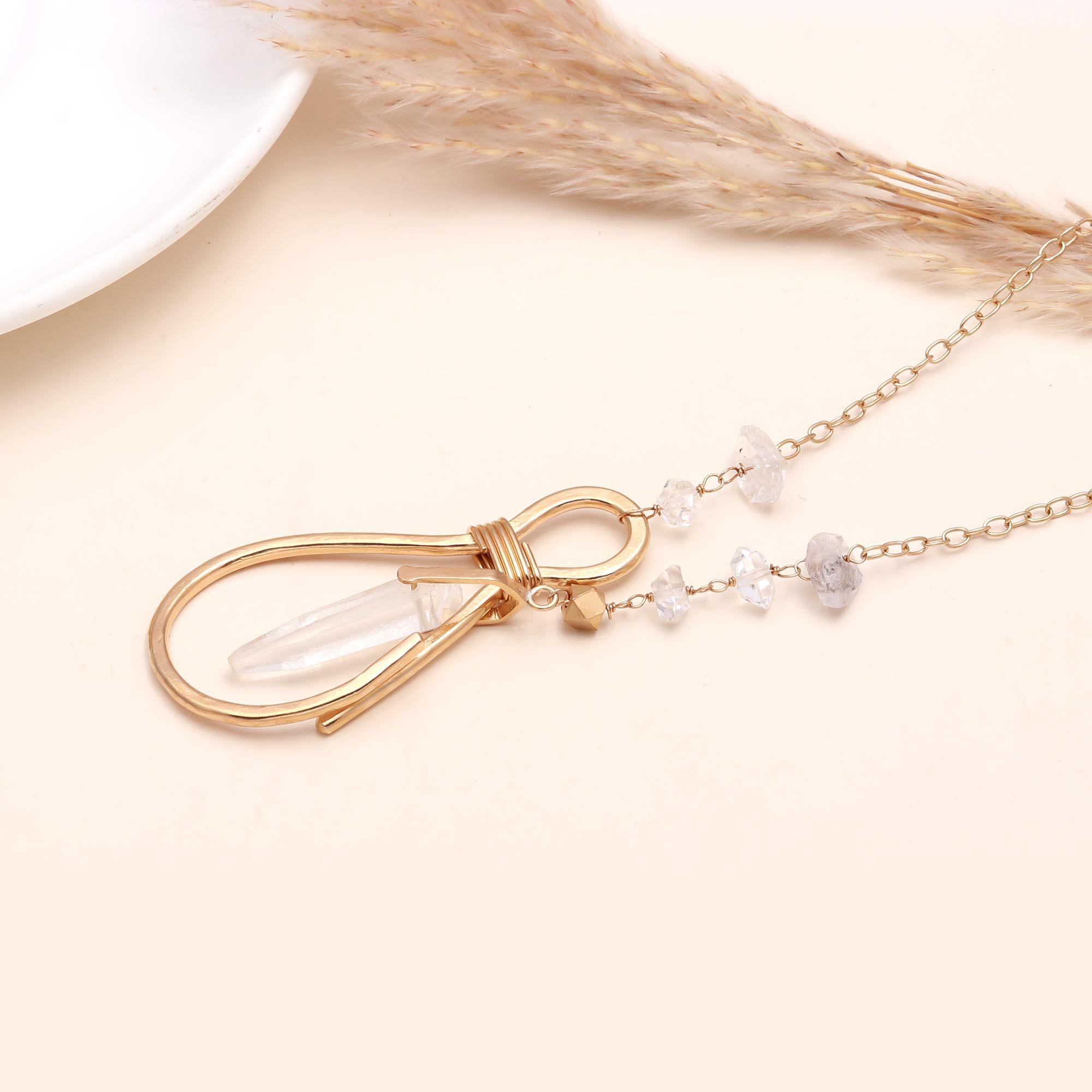 The Crystal Loop: Gold Wire Wrapped Raw Quartz Pendant