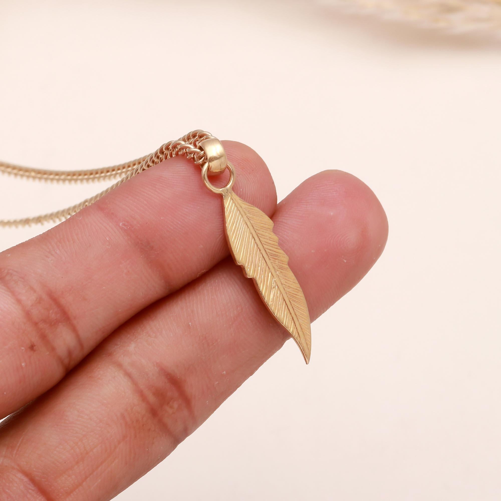 The Golden Quill: Detailed Gold Leaf Feather Pendant
