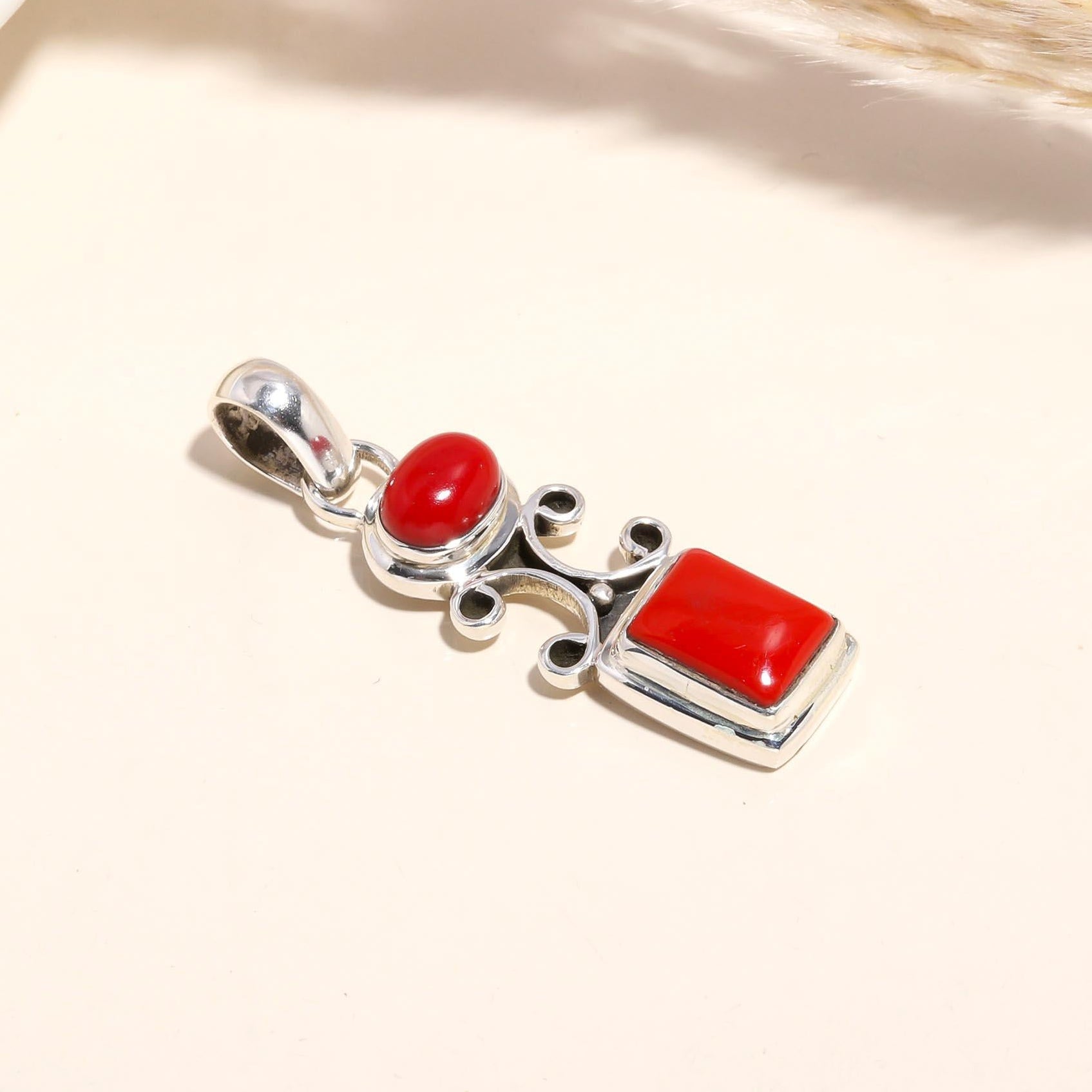 The Crimson Scrollwork: Vibrant Red Coral Pendant