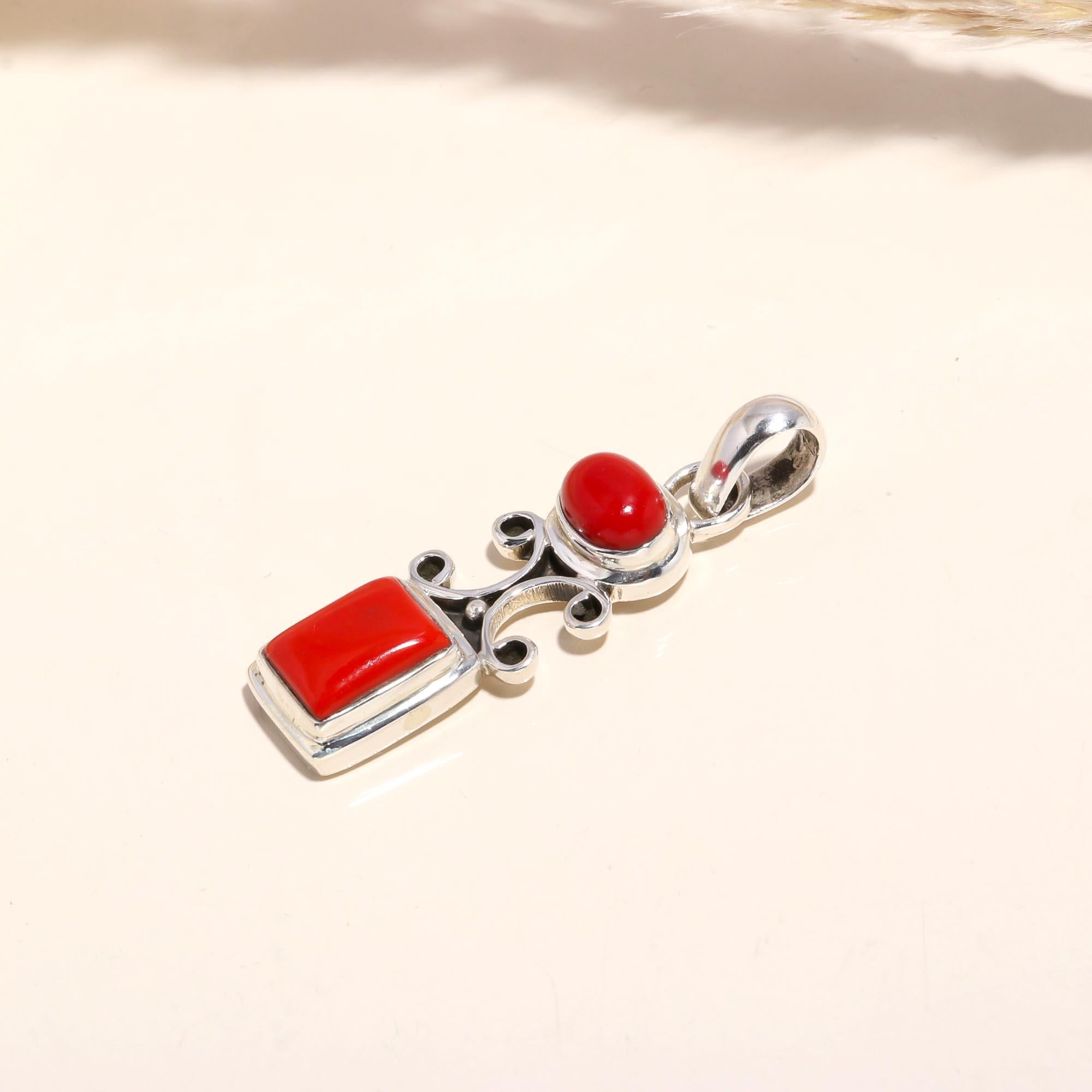 The Crimson Scrollwork: Vibrant Red Coral Pendant