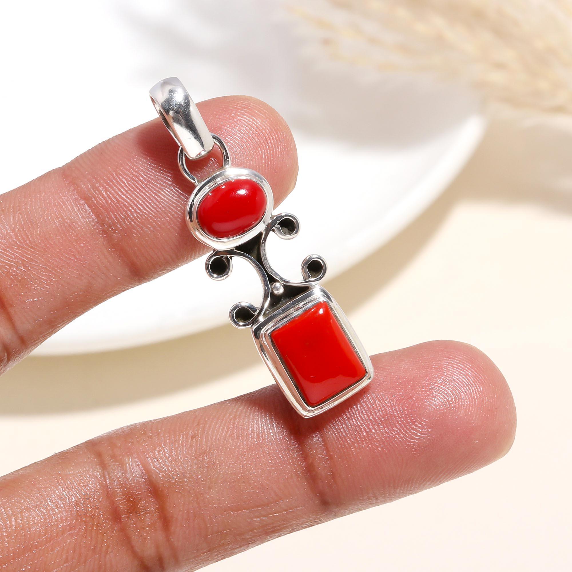 The Crimson Scrollwork: Vibrant Red Coral Pendant