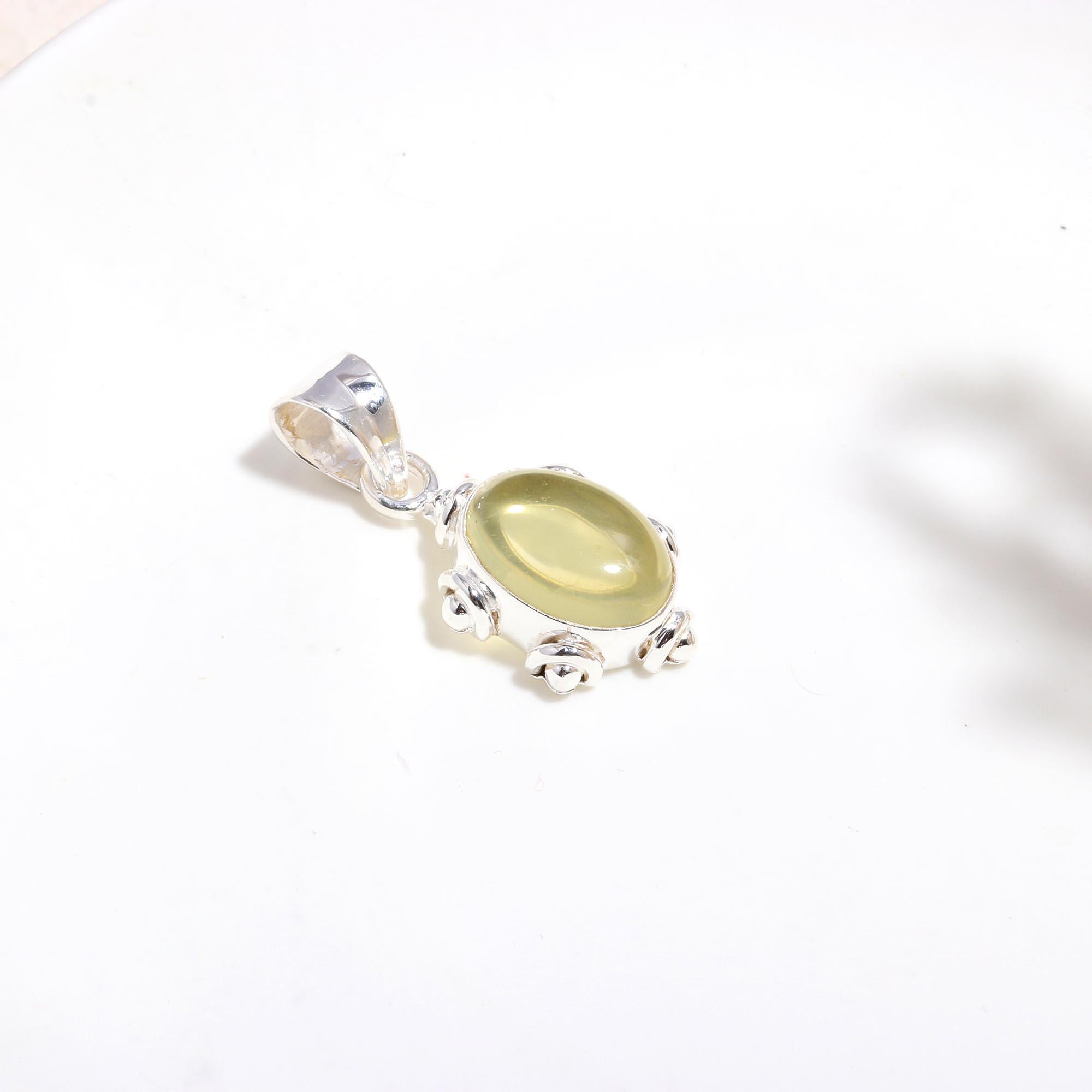 The Solar Pebble: Minimalist Studded Oval Charm