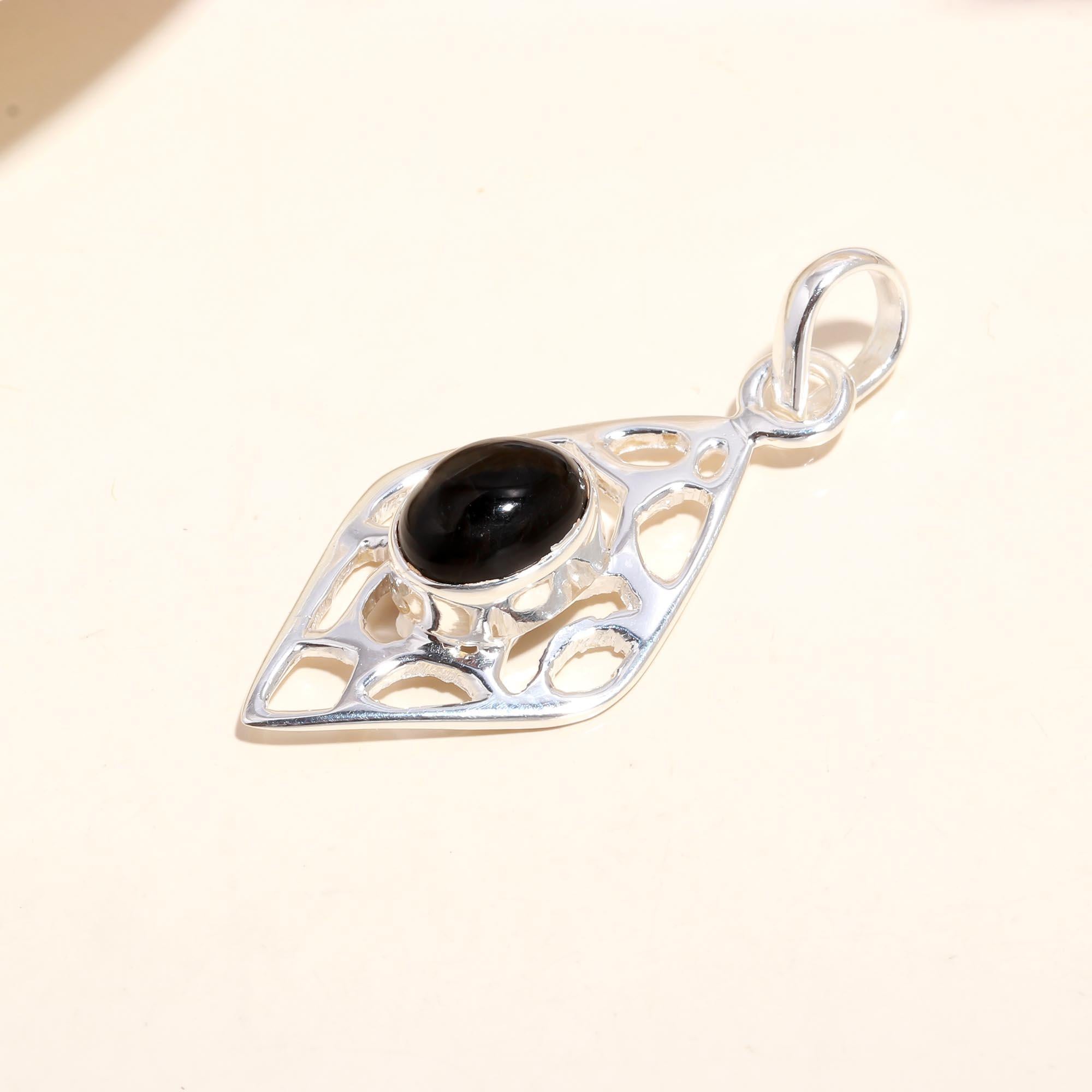 The Diamond Window: Black Onyx Filigree Pendant