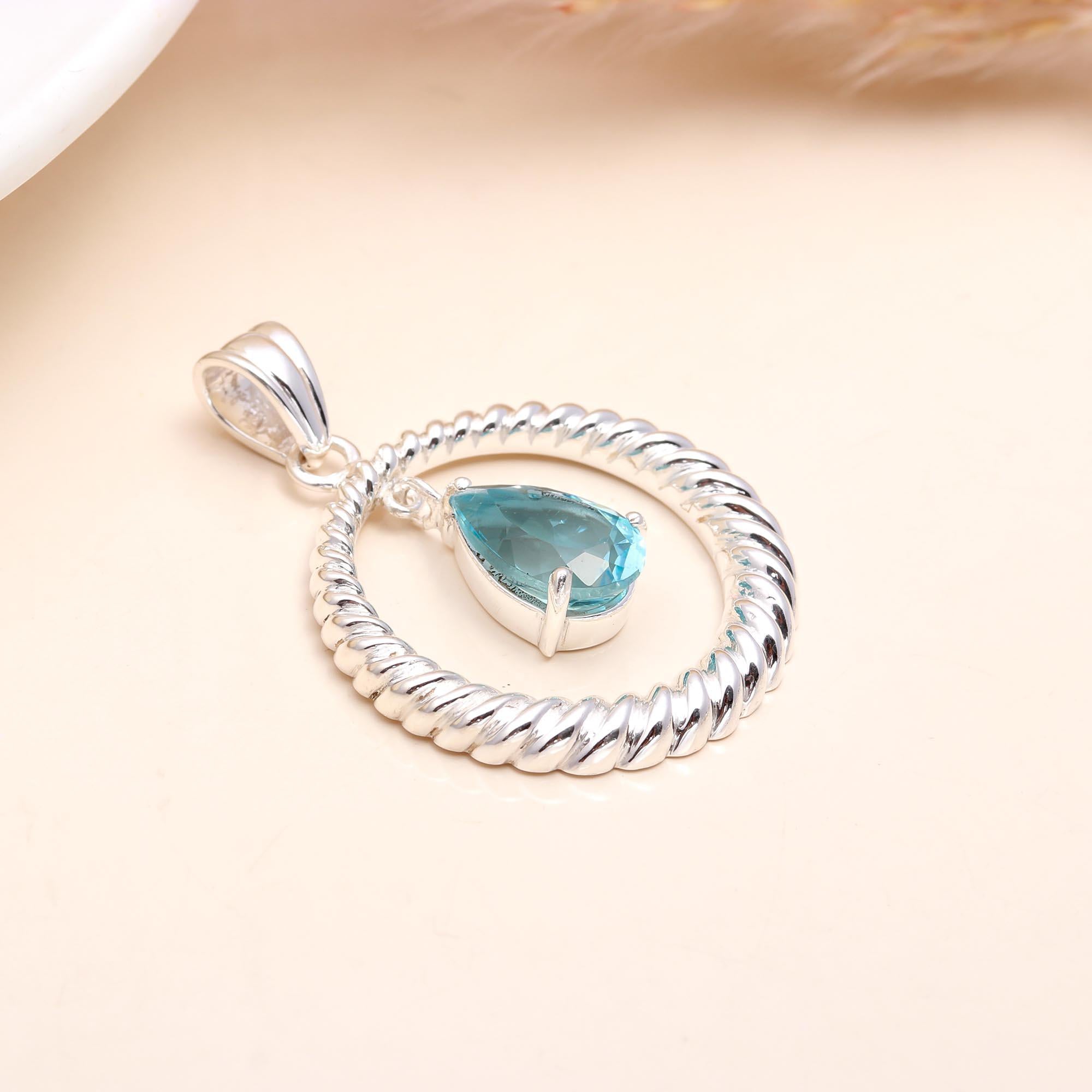 The Infinity Hoop: Blue Topaz Rope Pendant