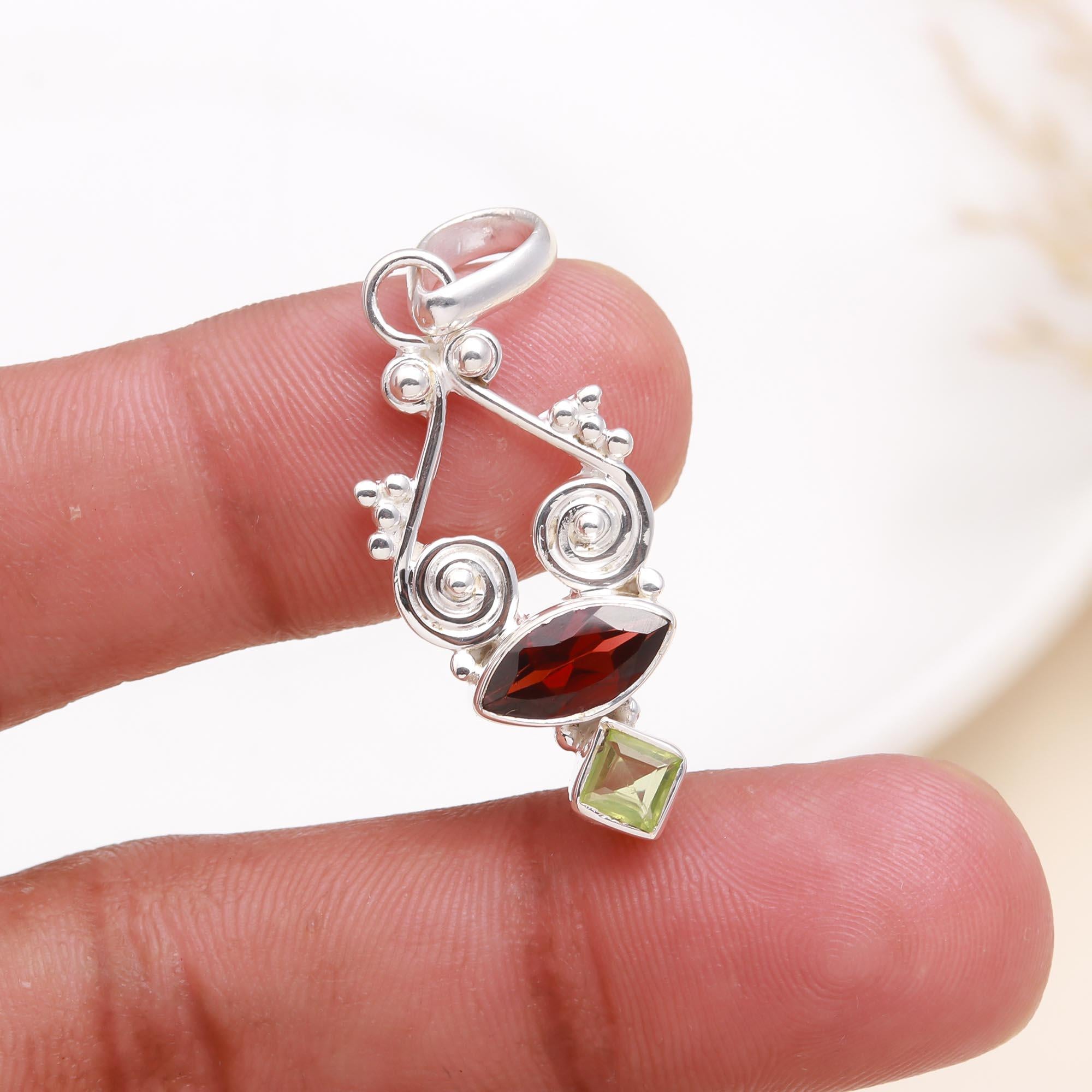 The Garnet Helix: Abstract Garnet & Peridot Silver Pendant