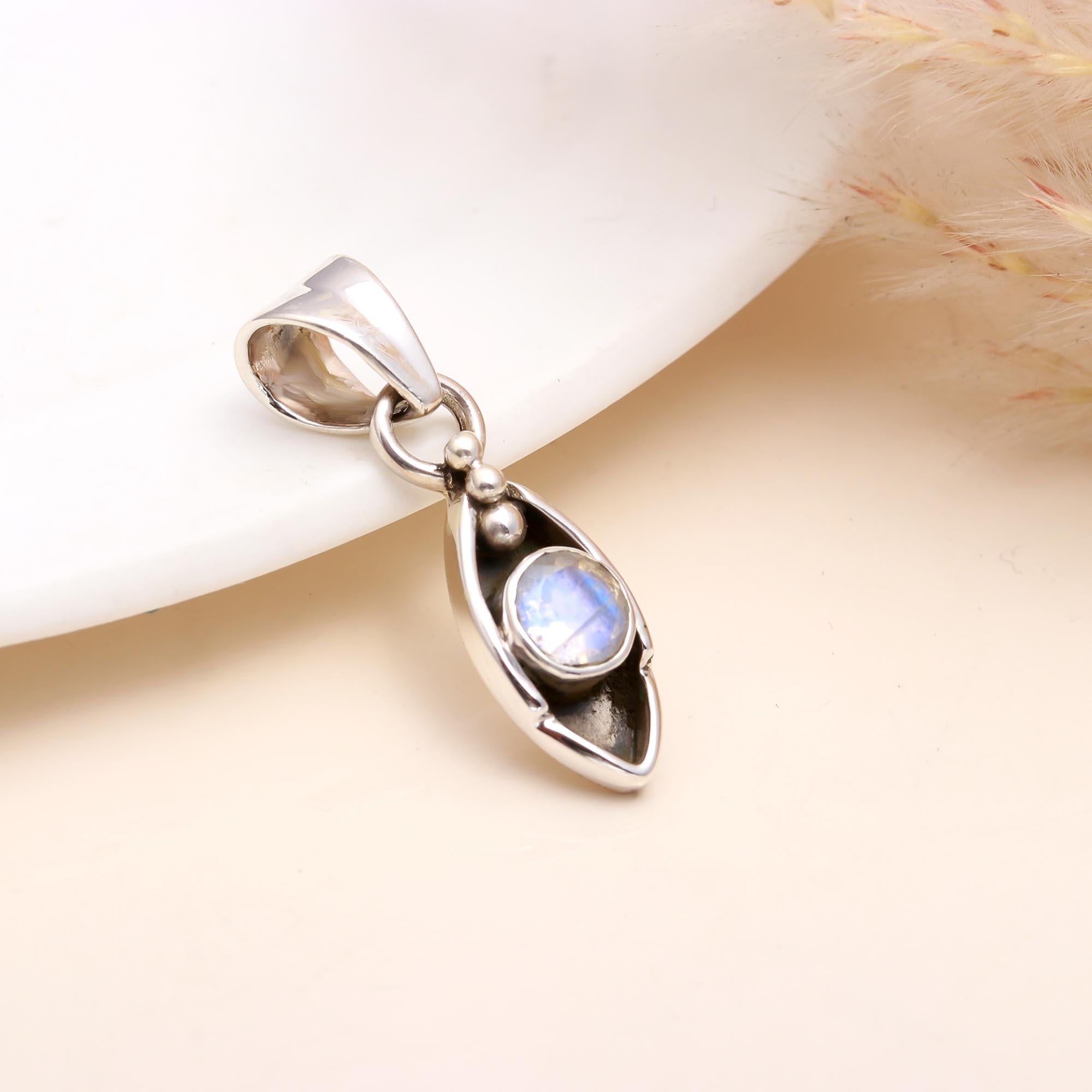 The Moonstone Arc: Minimalist Silver Charm