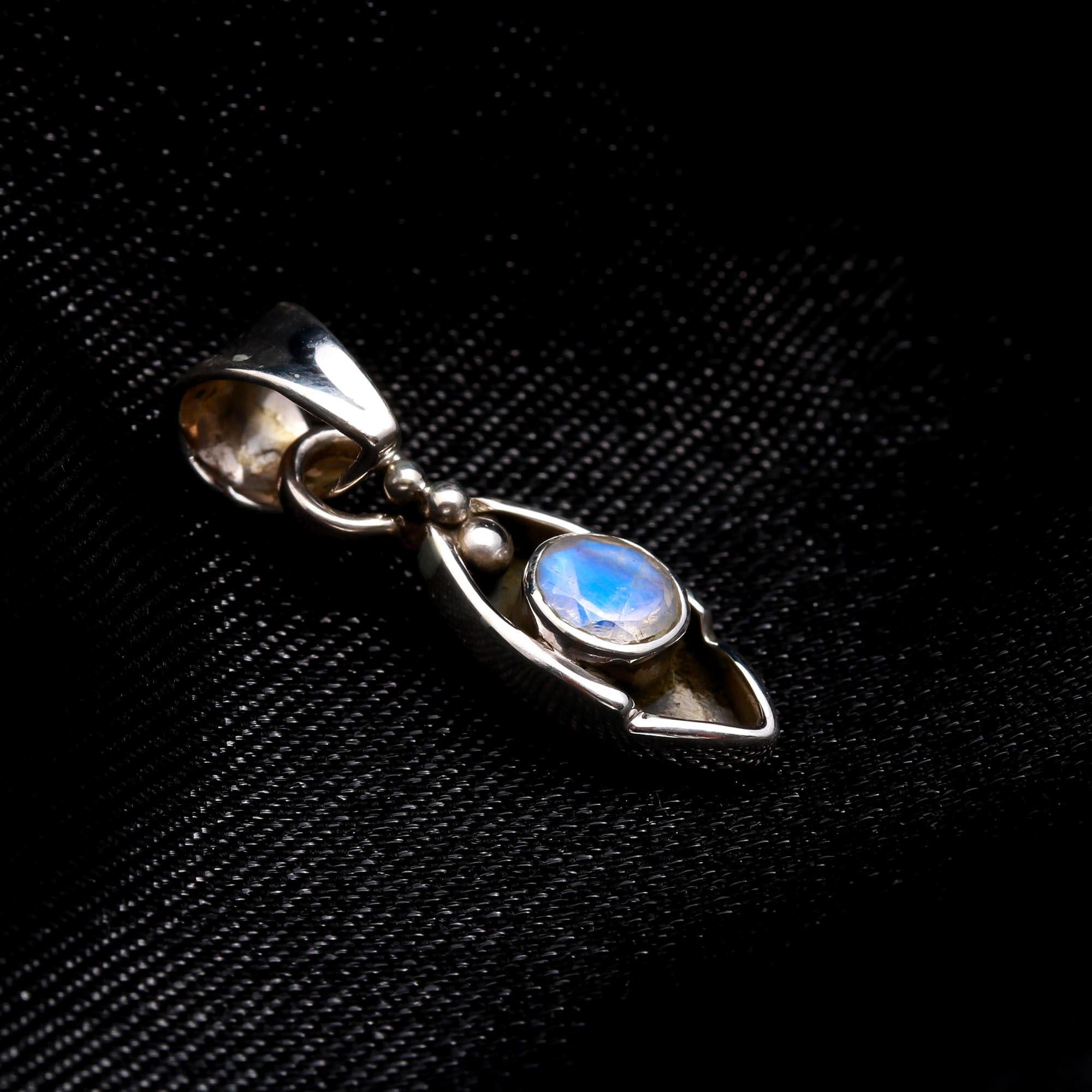The Moonstone Arc: Minimalist Silver Charm