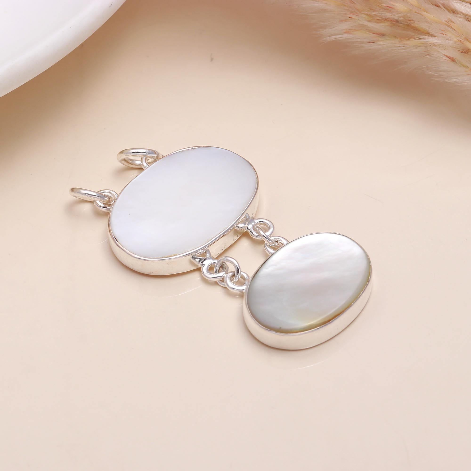 The Pearl Tier: Articulated Mother of Pearl Silver Pendant
