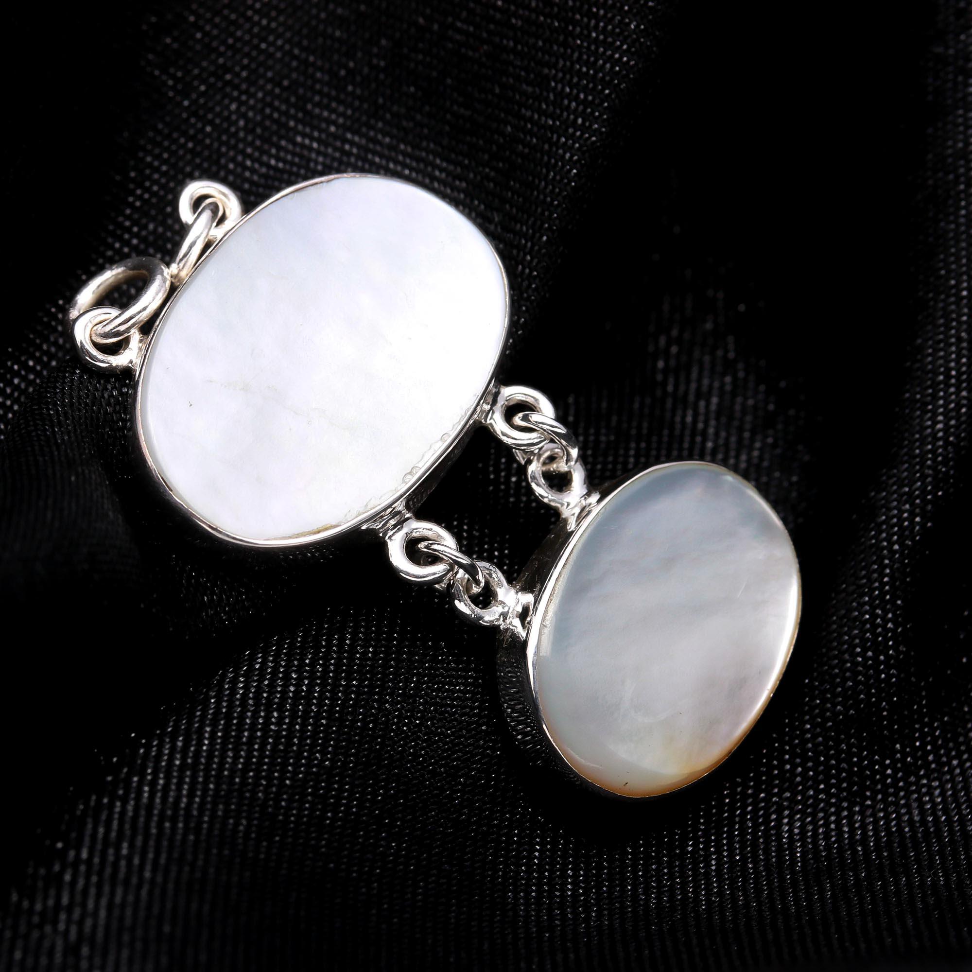 The Pearl Tier: Articulated Mother of Pearl Silver Pendant
