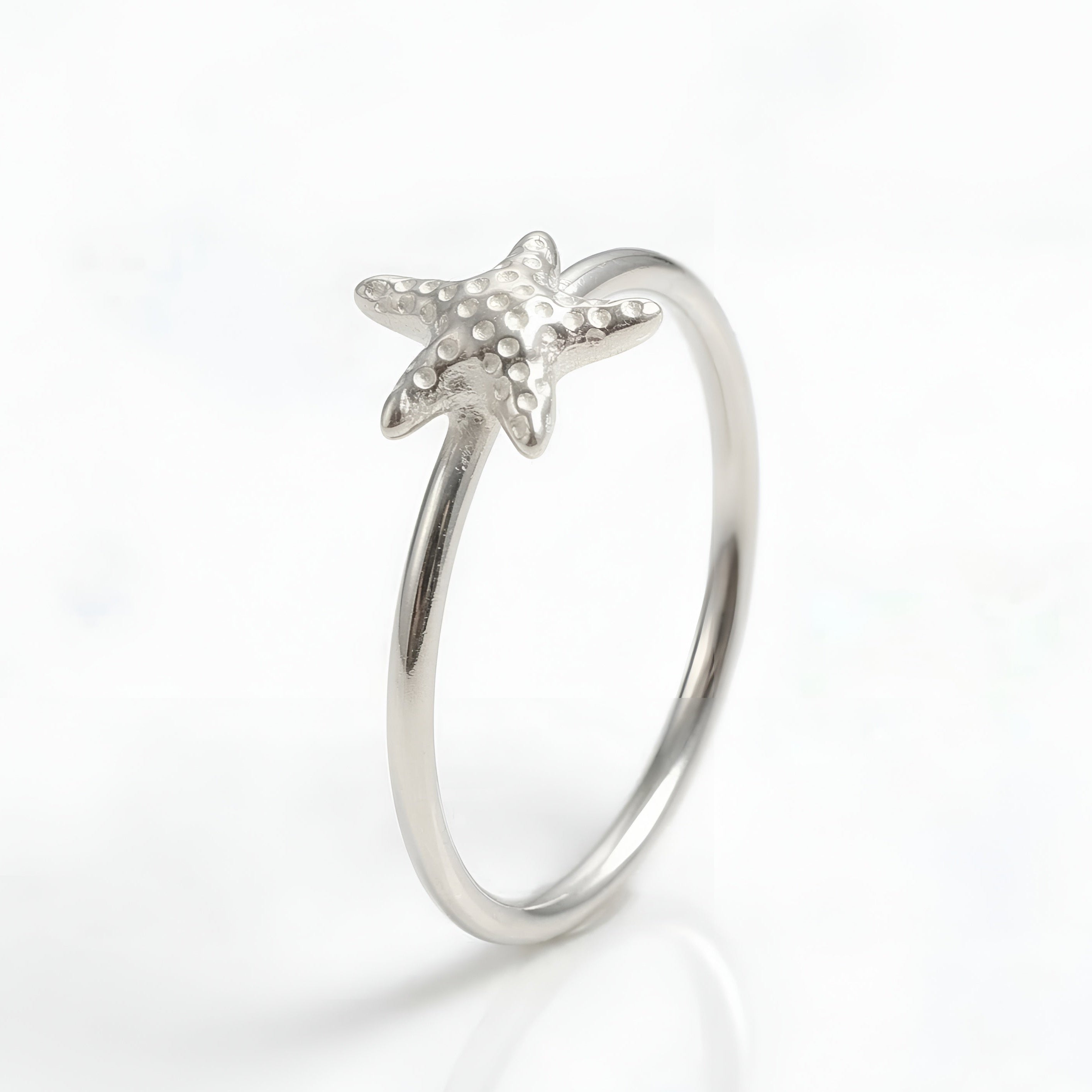 The Coastal Charm: Silver Starfish Minimalist Ring