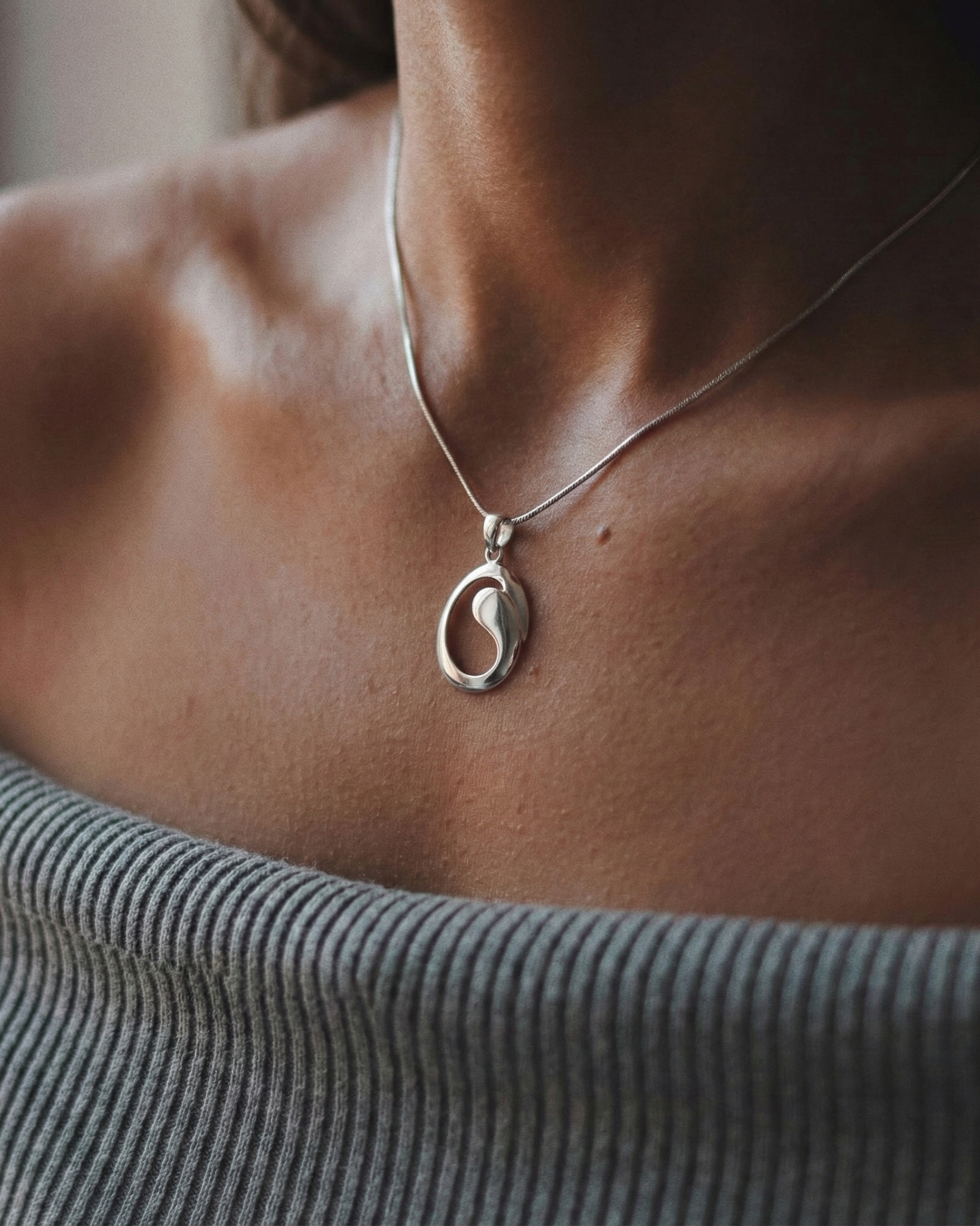 The Modern Orbit: Abstract Sterling Silver Oval Pendant