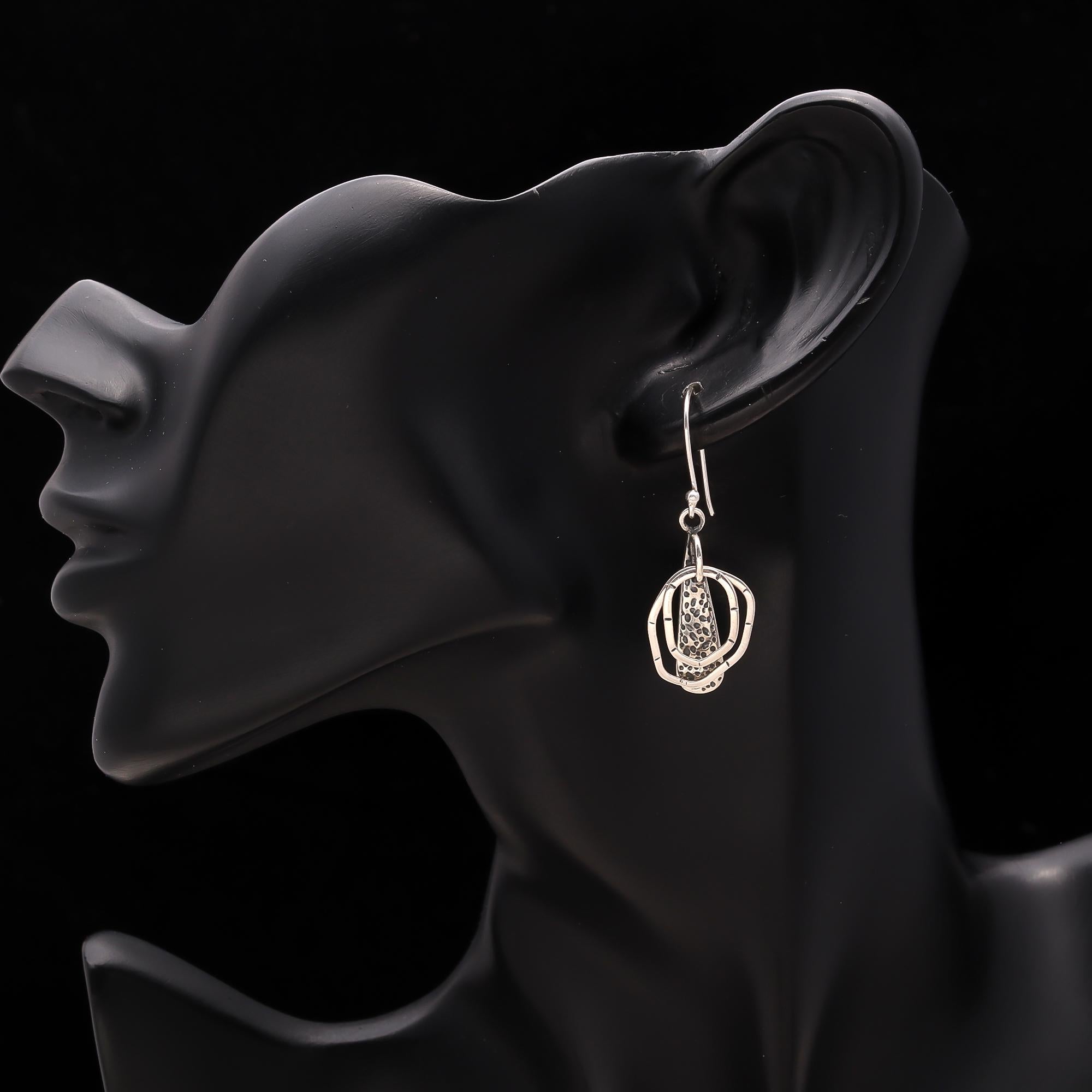 The Textured Geometry: Artisan Hammered Silver Earrings