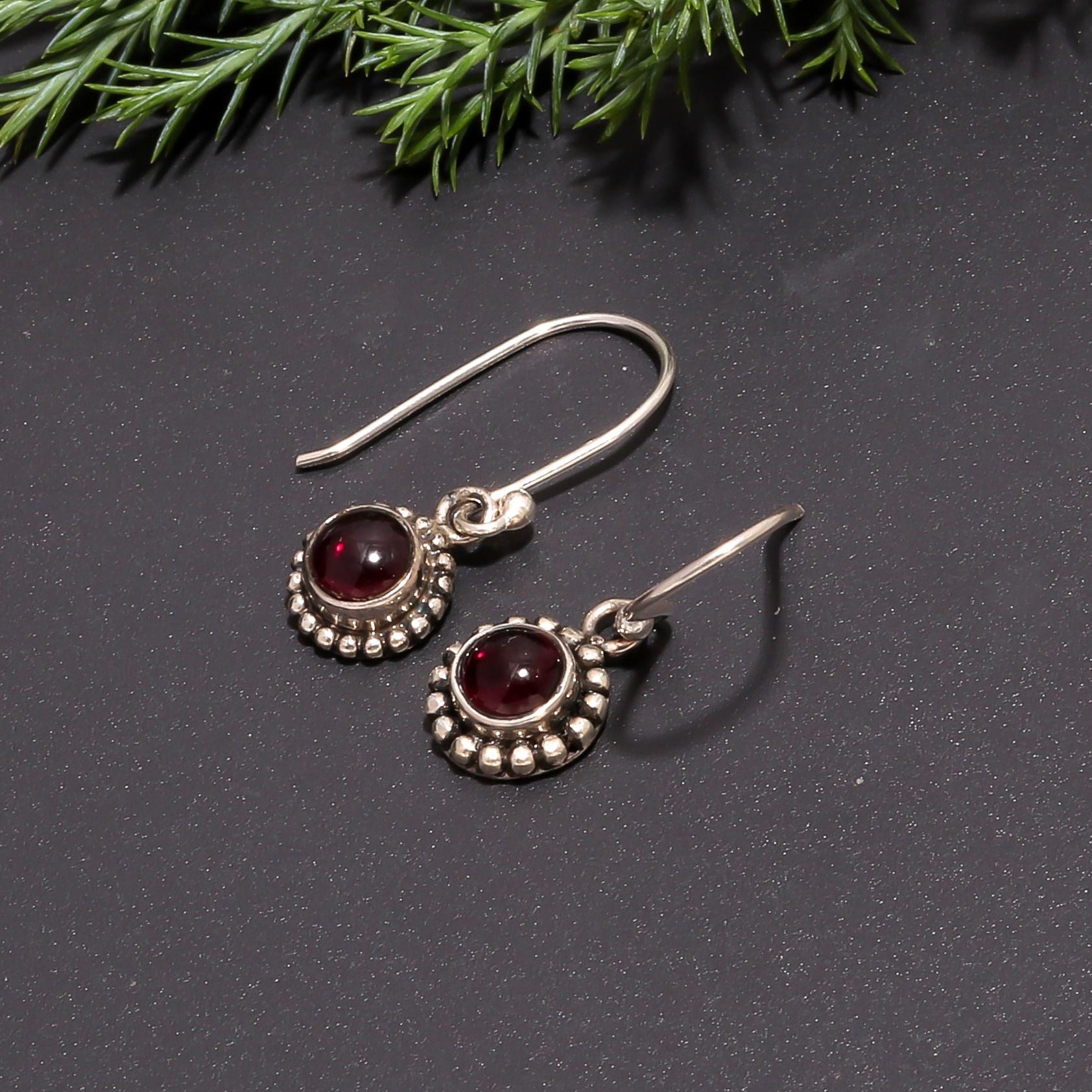 The Garnet Halo: Ornate Silver Garnet Earrings