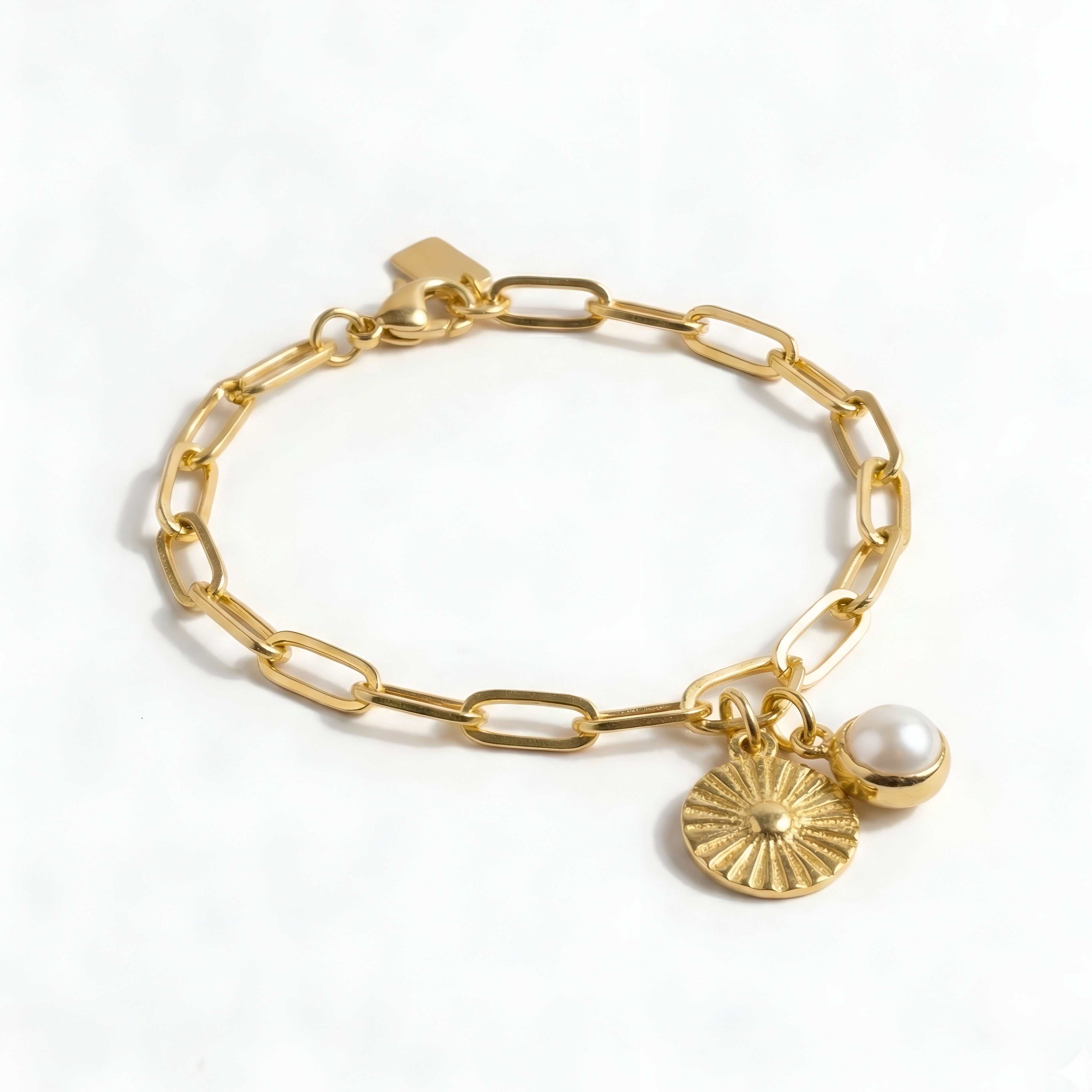 The Soleil Sacré: Sun Medallion & Pearl Charm Bracelet