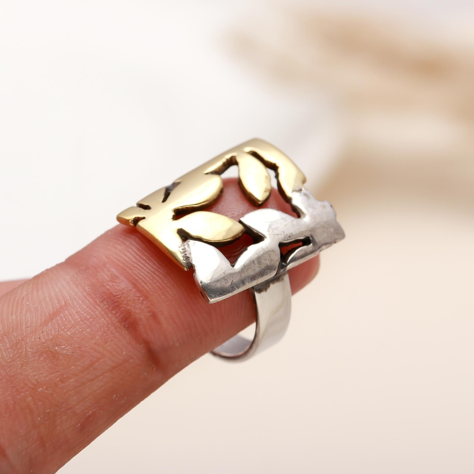 Sterling silver ring with leaf cutout and dual-tone finish