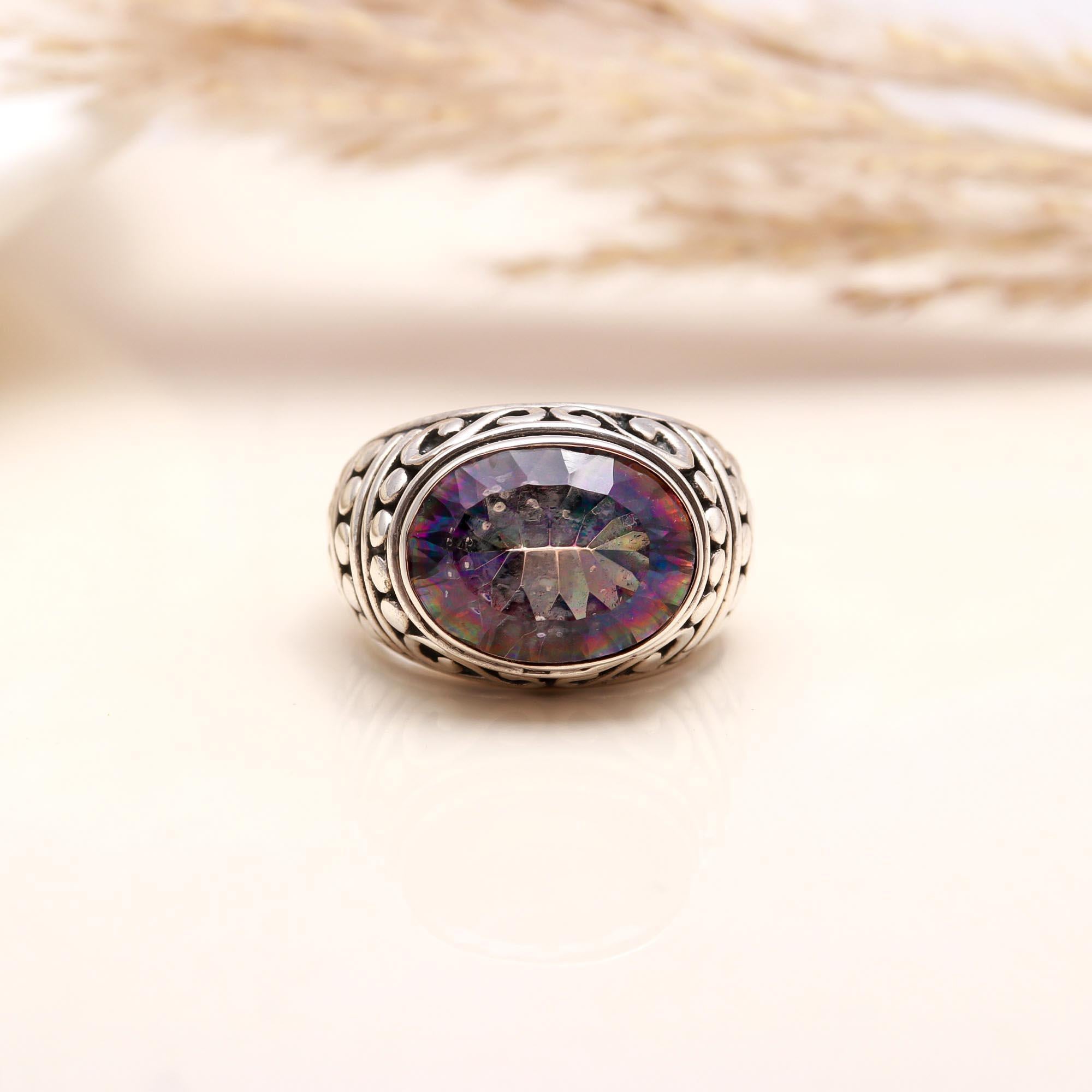 oval mystic topaz set in sterling silver band