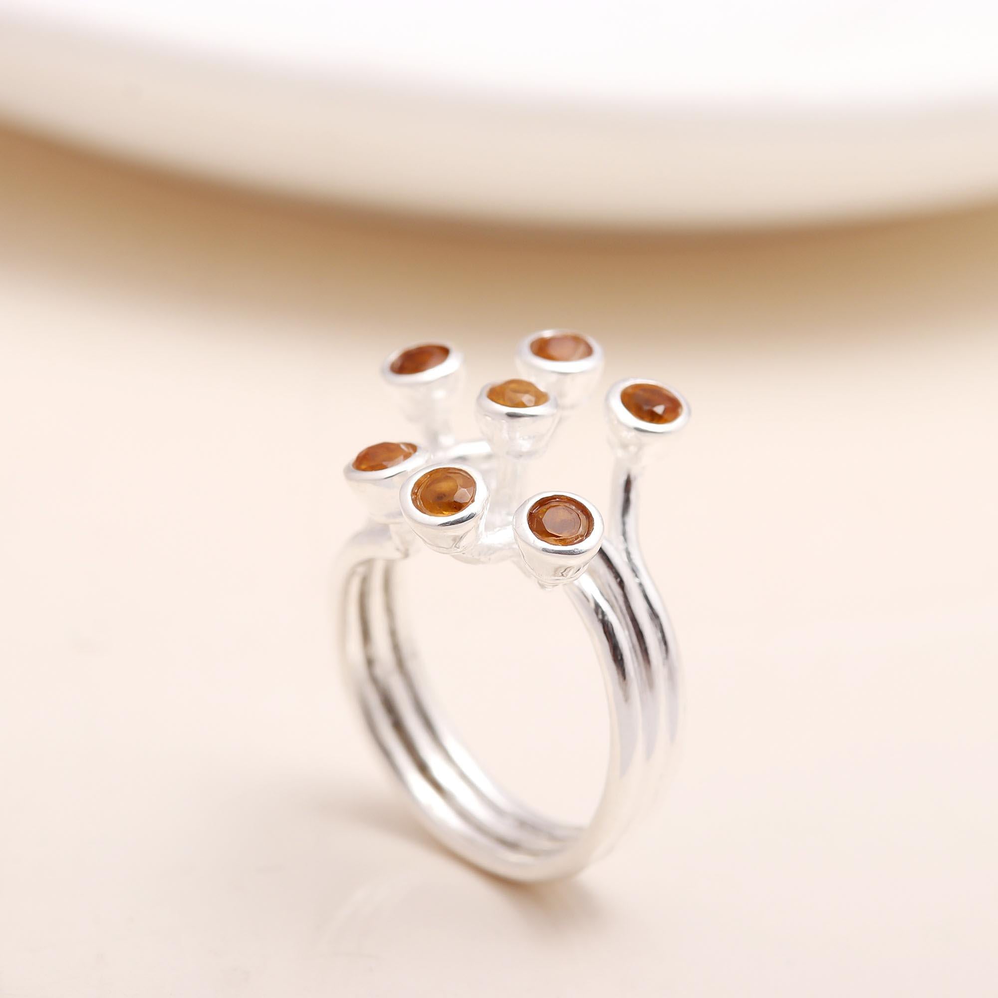 The Hessonite Spray: Multi-Level Bezel Ring
