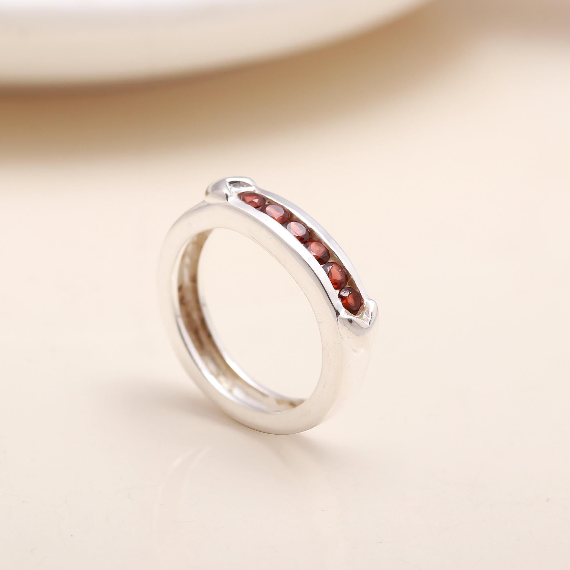 The Red Path: Channel Set Garnet Eternity Style Ring