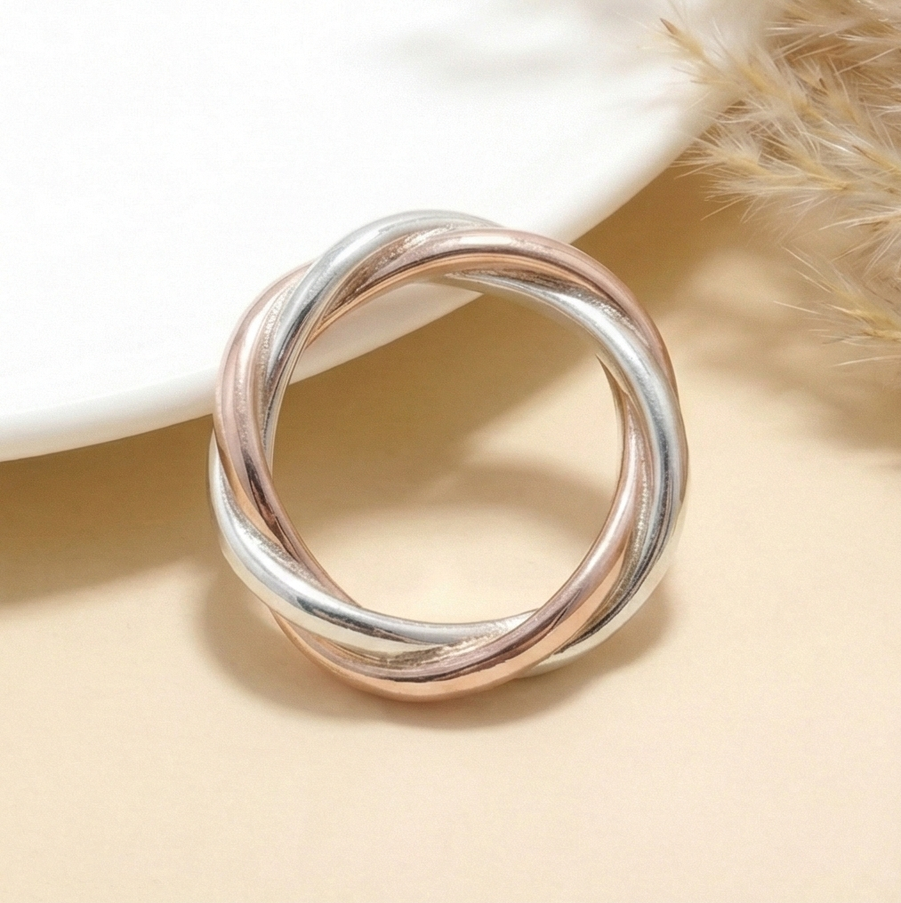 The Eternal Trinity: Twisted Rolling Band Ring