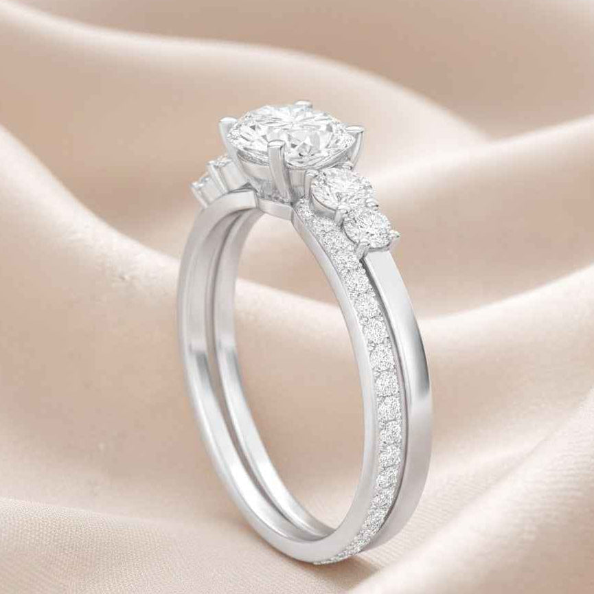 The Starlit Promise: 1.4ct Oval Moissanite Bridal Ring Set