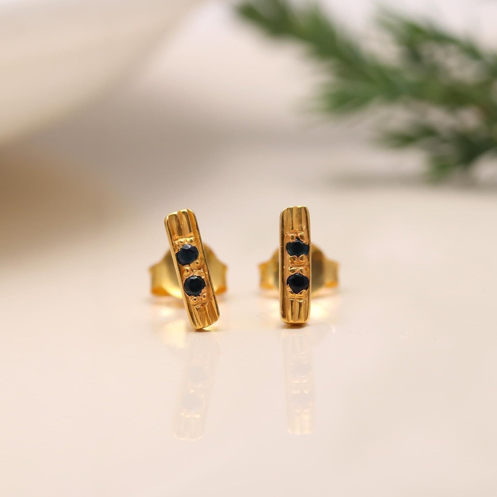 The Gilded Stripe: Textured Gold & Blue Sapphire Bar Studs