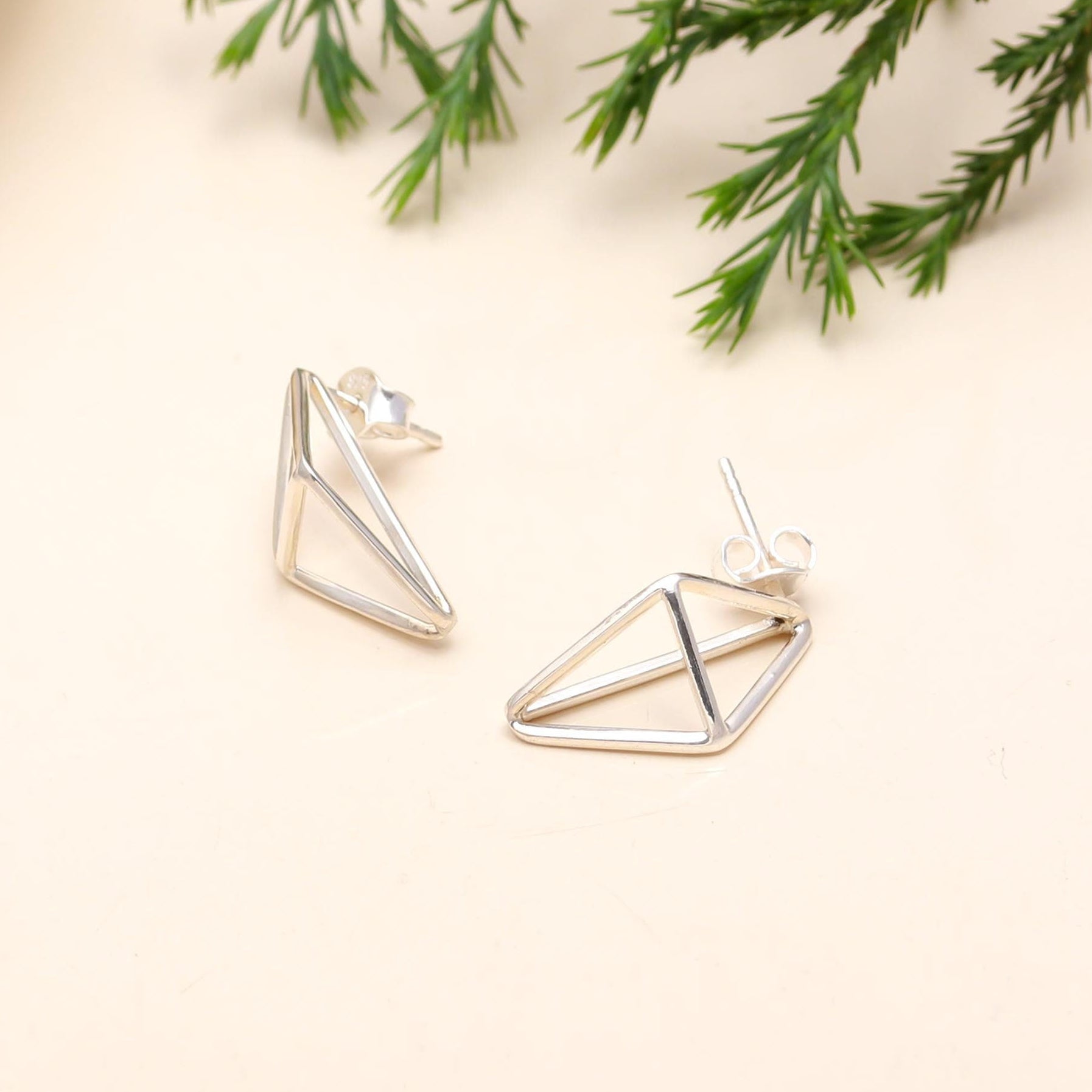 The Silver Apex: Geometric Prism Stud Earrings